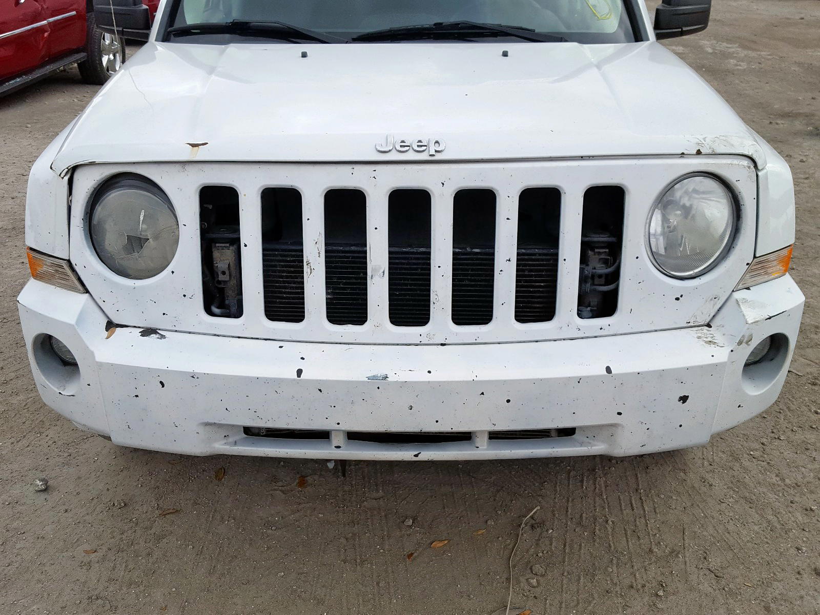 Photo 9 from auction – 2011 JEEP PATRIOT SP with VIN 1J4NT1GA3BD205223