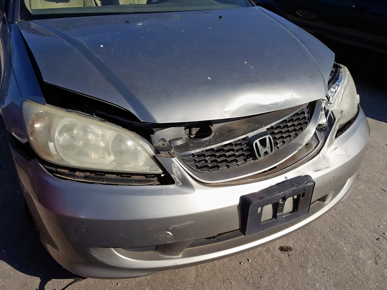 Photo 9 from auction – 2004 HONDA CIVIC LX with VIN 1HGEM22644L004808