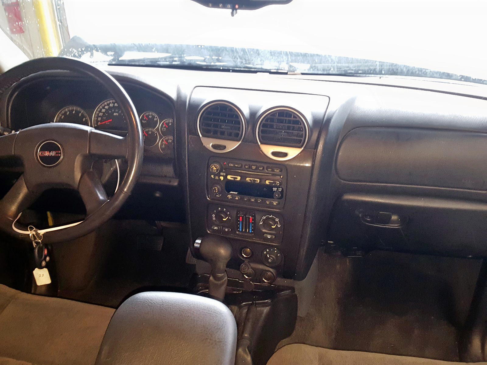 Photo 9 from auction – 2005 GMC ENVOY with VIN 1GKDS13S252164994