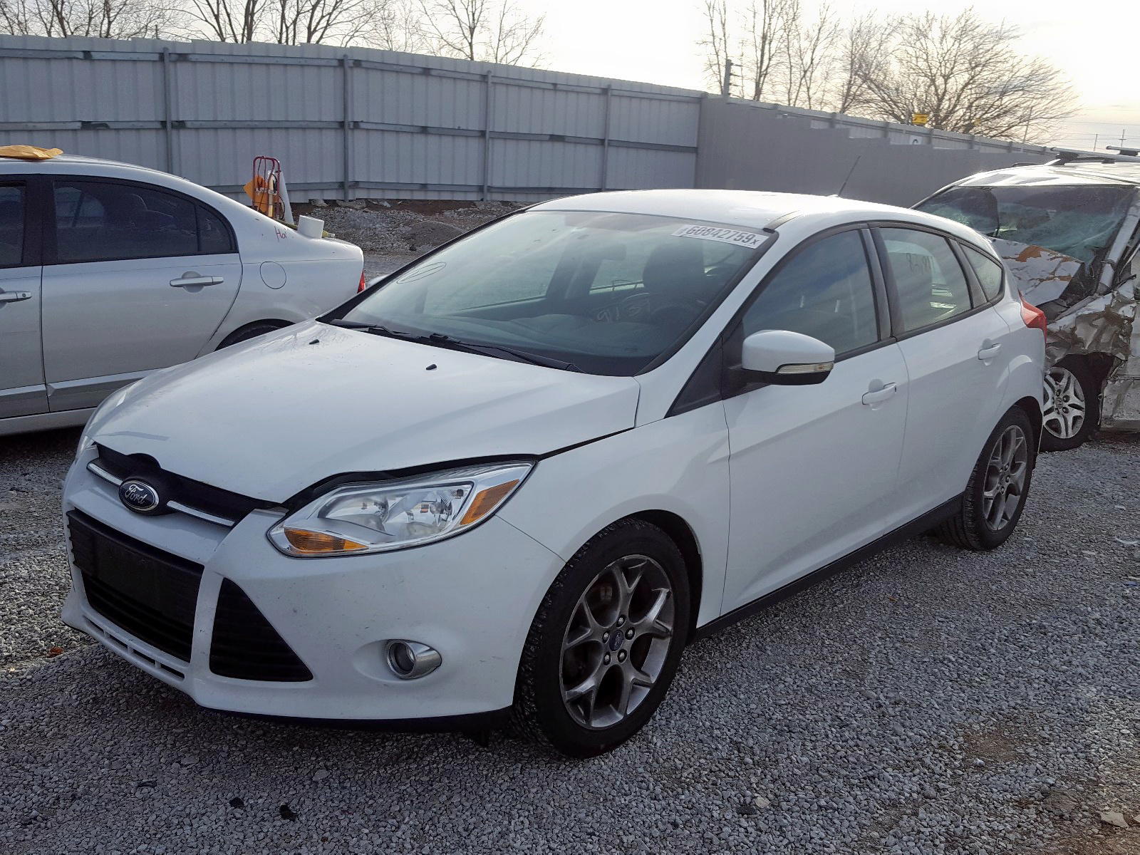 Photo 2 from auction – 2013 FORD FOCUS SE with VIN 1FADP3K28DL169139
