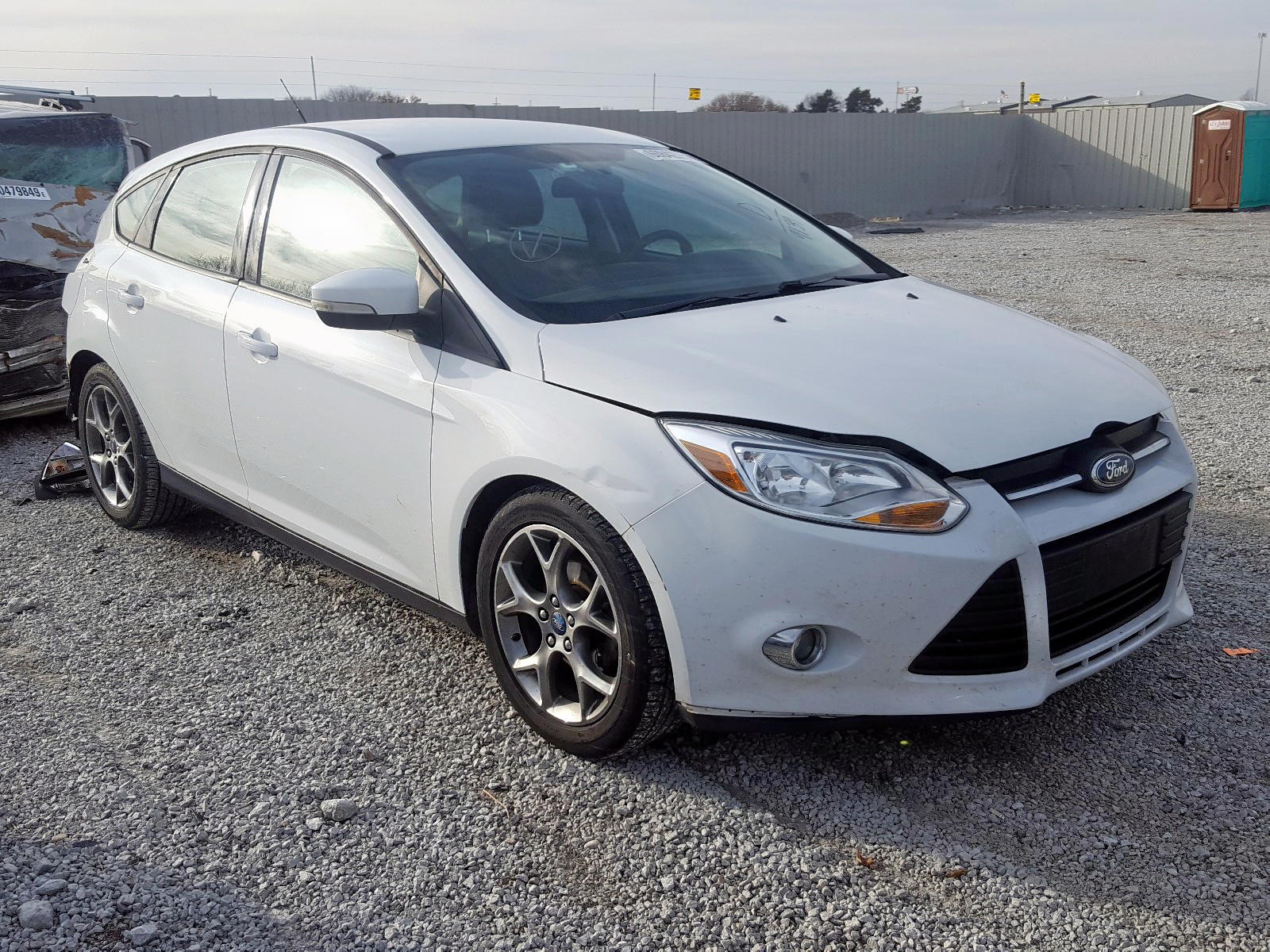 FORD FOCUS SE 2013 with VIN 1FADP3K28DL169139 - Photo from auction