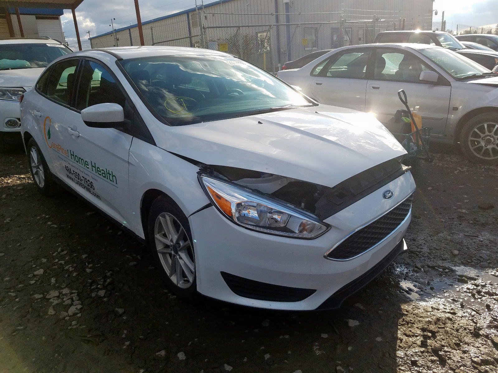 FORD FOCUS SE 2018 with VIN 1FADP3F29JL219665 - Photo from auction