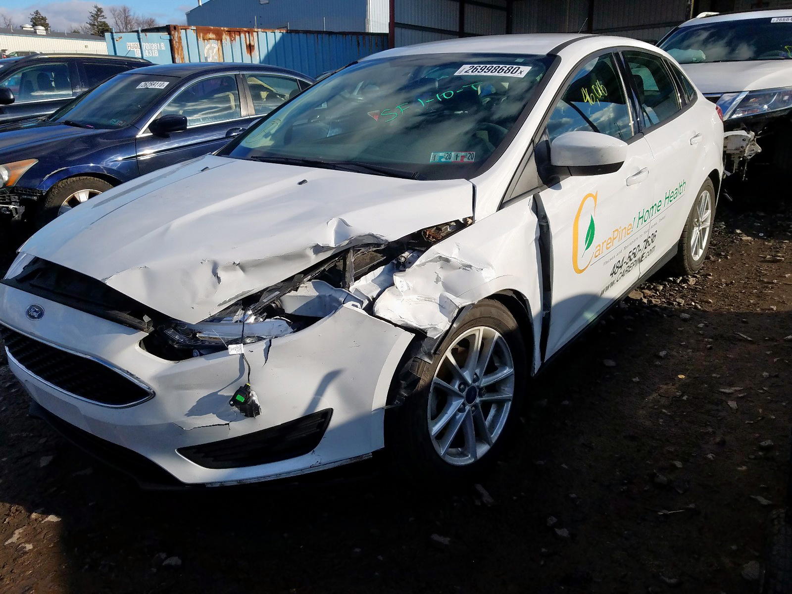 Photo 2 from auction – 2018 FORD FOCUS SE with VIN 1FADP3F29JL219665