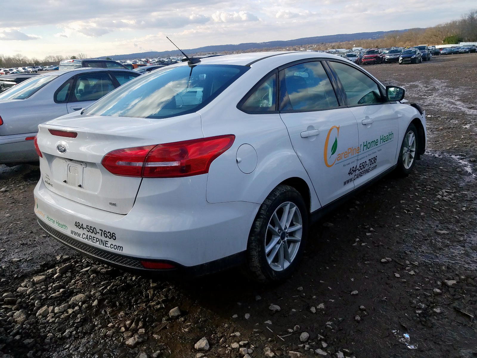 Photo 4 from auction – 2018 FORD FOCUS SE with VIN 1FADP3F29JL219665