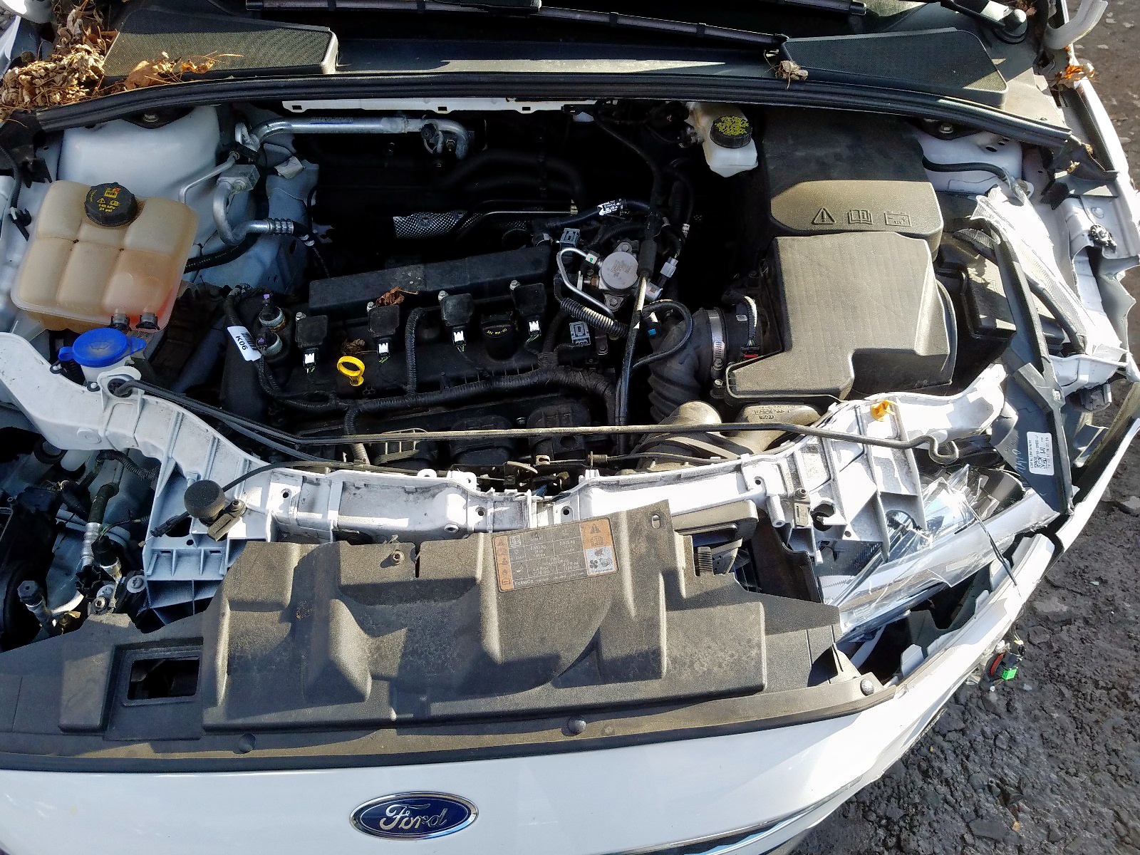 Foto 7 de la subasta – 2018 FORD FOCUS SE con VIN 1FADP3F29JL219665