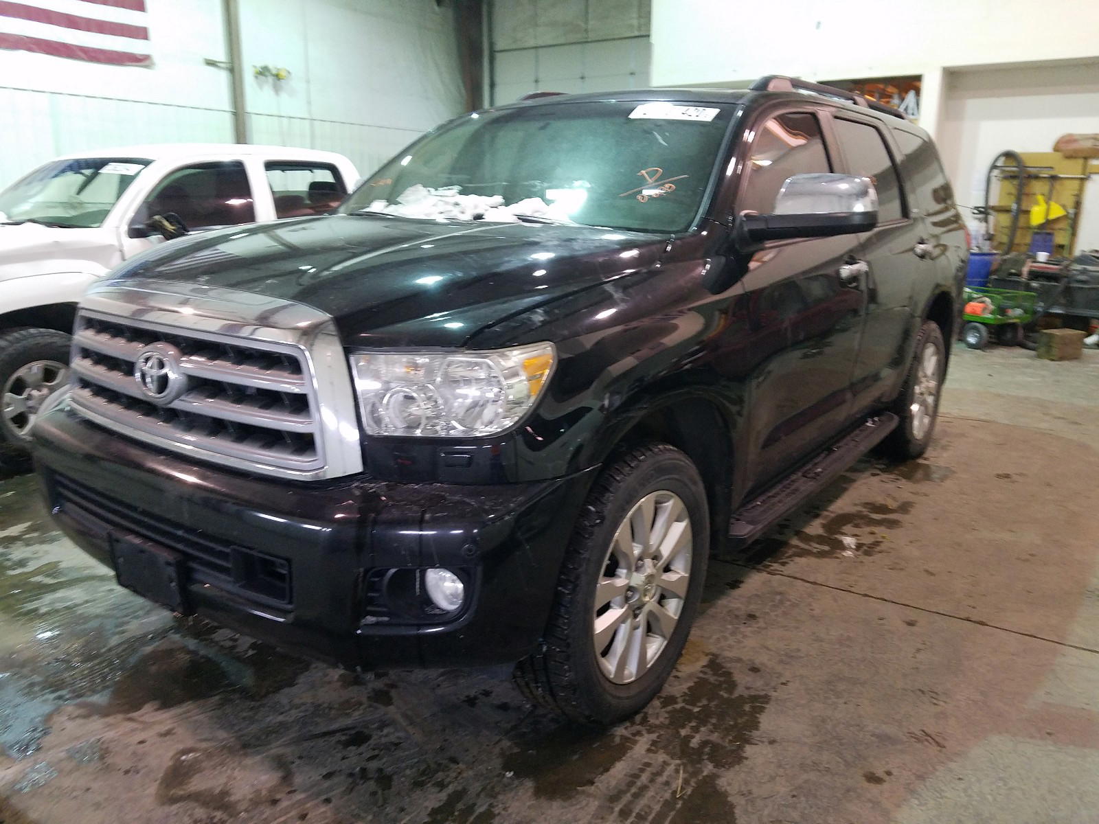 Photo 2 from auction – 2012 TOYOTA SEQUOIA PL with VIN 5TDDW5G16CS070809