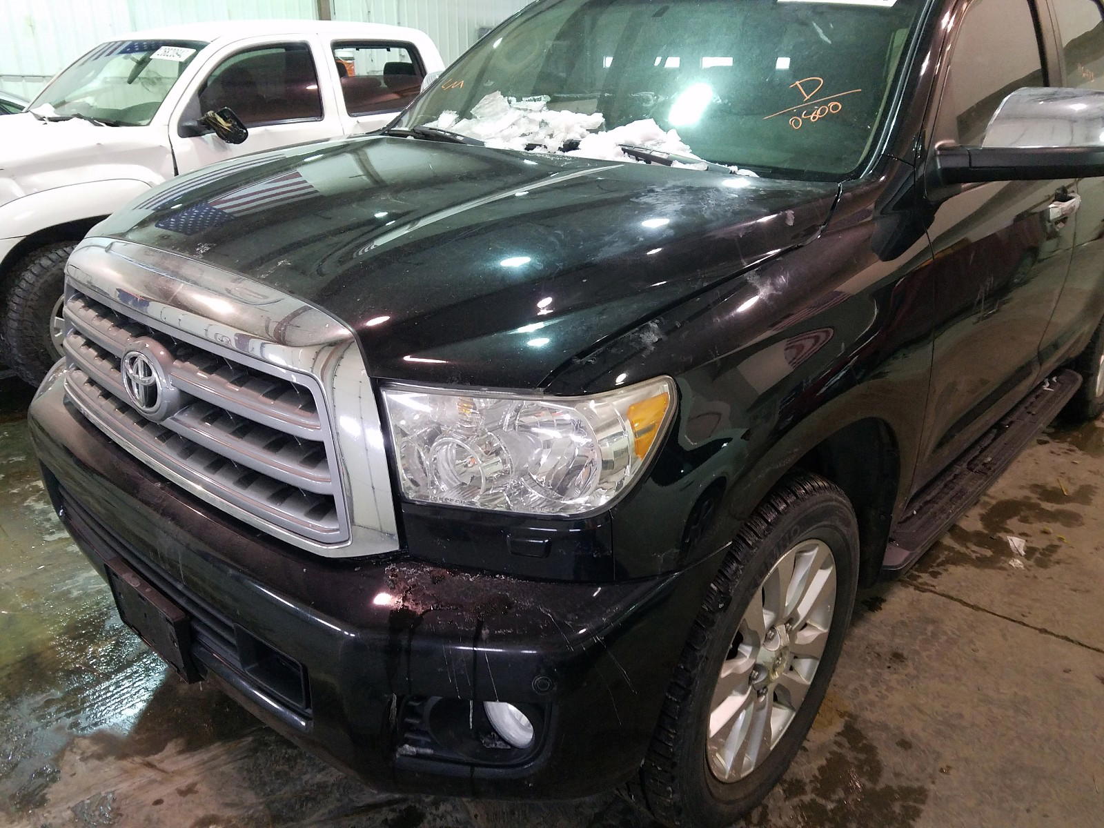Photo 9 from auction – 2012 TOYOTA SEQUOIA PL with VIN 5TDDW5G16CS070809