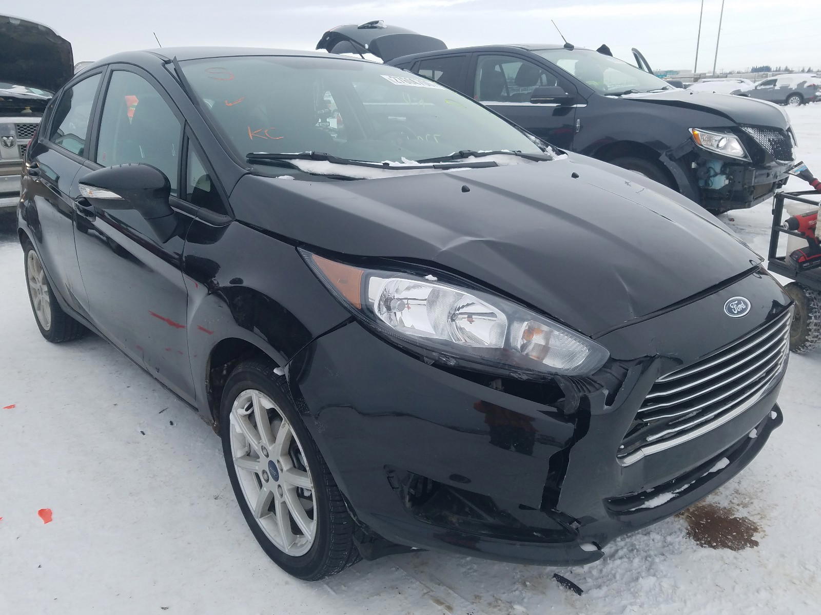 FORD FIESTA SE 2014 with VIN 3FADP4EJ0EM238043 - Photo from auction