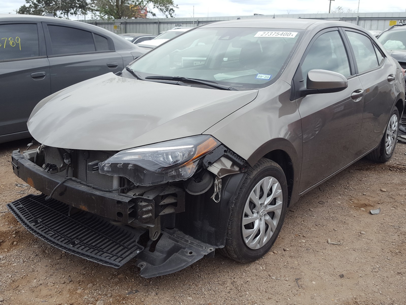 Photo 2 from auction – 2019 TOYOTA COROLLA L with VIN 5YFBURHE1KP898036