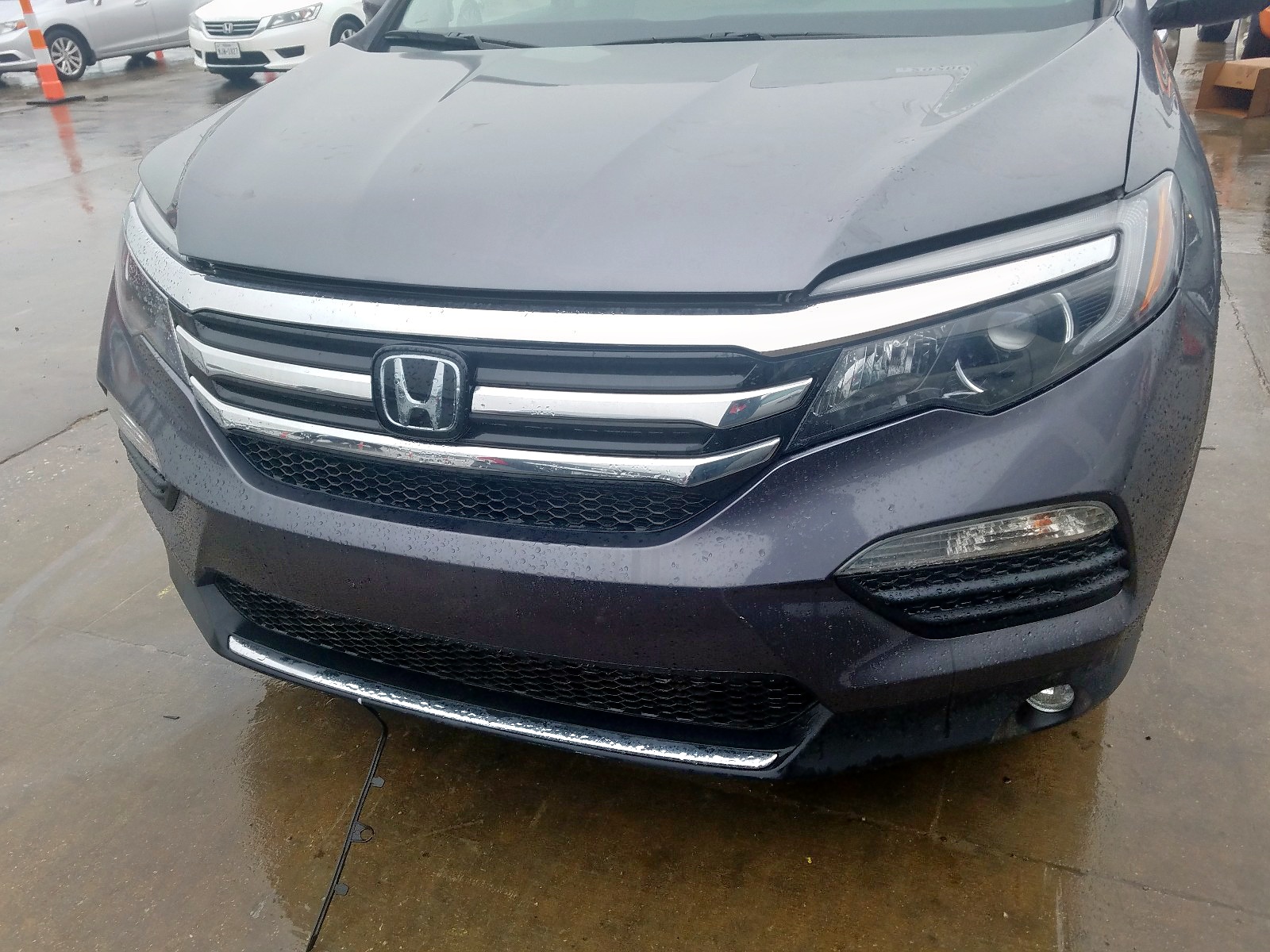 Photo 9 from auction – 2017 HONDA PILOT TOUR with VIN 5FNYF5H98HB001301