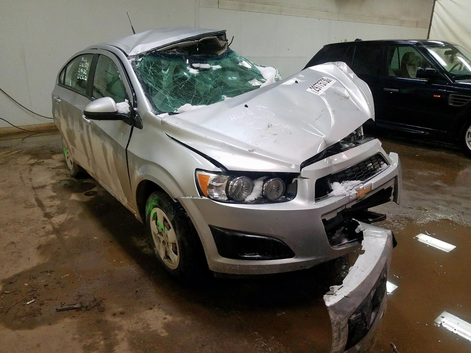 CHEVROLET SONIC LS 2013 with VIN 1G1JA5SH7D4240574 - Photo from auction