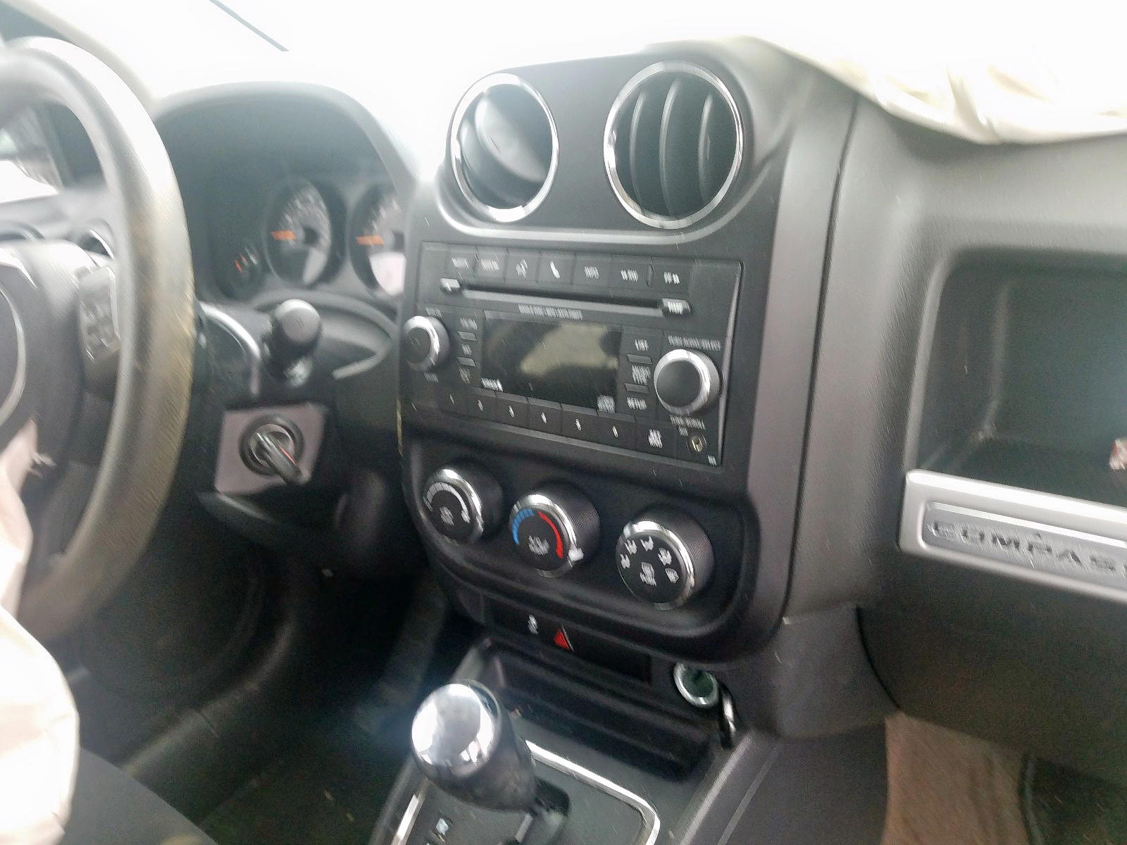 Photo 9 from auction – 2014 JEEP COMPASS SP with VIN 1C4NJCBB5ED754479