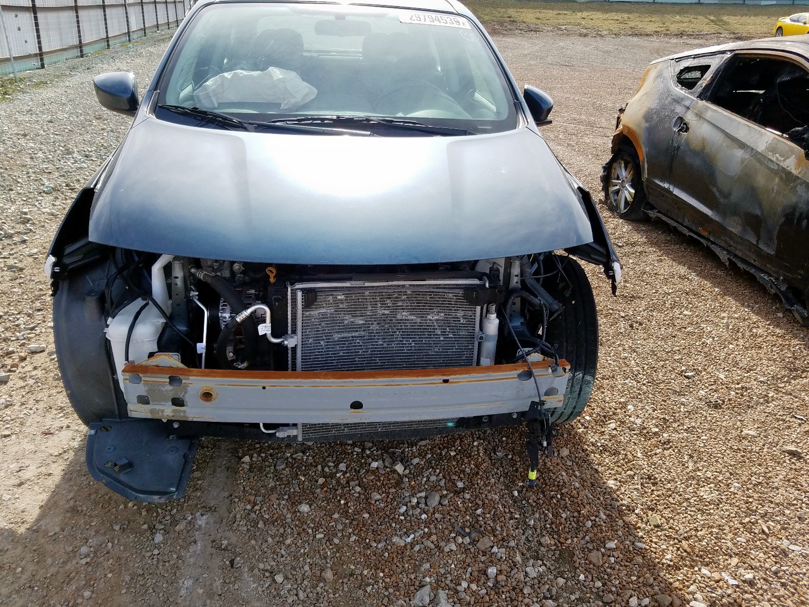 Photo 9 from auction – 2017 NISSAN VERSA S with VIN 3N1CN7AP6HL897006