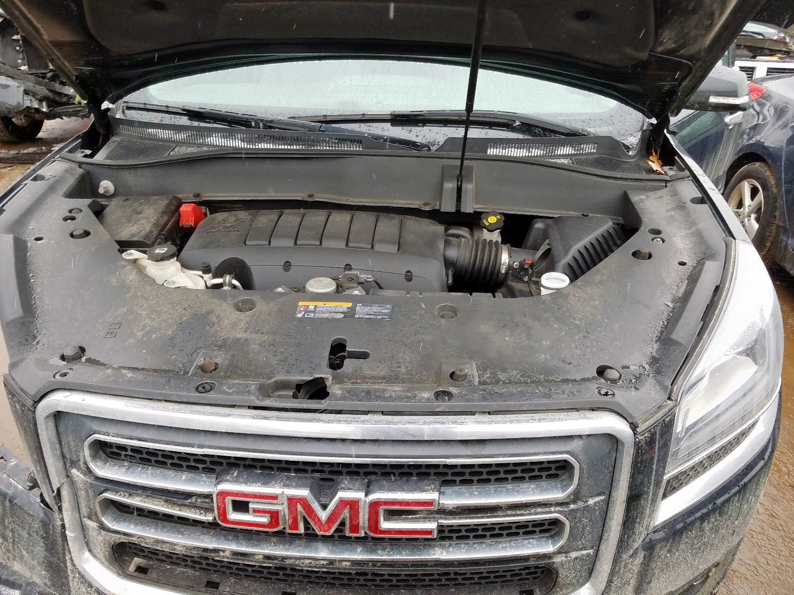 Photo 7 from auction – 2014 GMC ACADIA SLT with VIN 1GKKRRKD8EJ340599