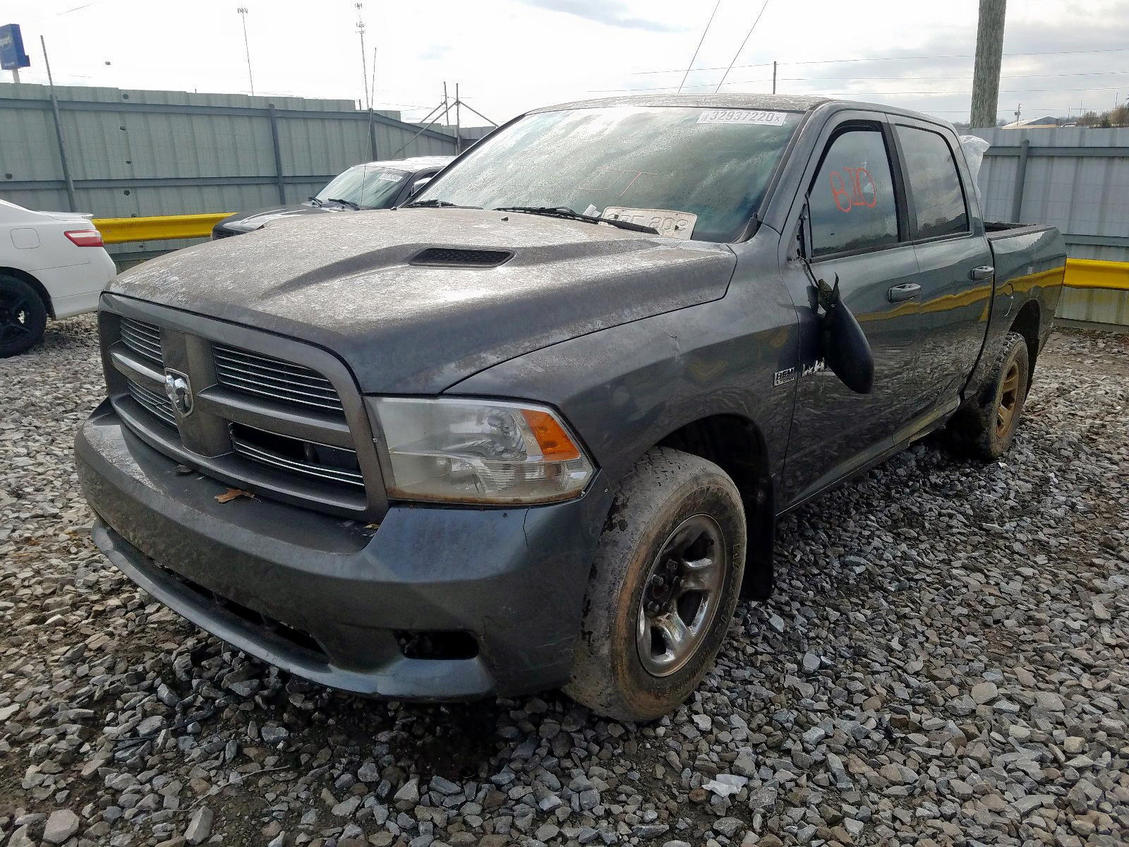 Photo 2 from auction – 2011 DODGE RAM 1500 with VIN 1D7RV1CT2BS675396
