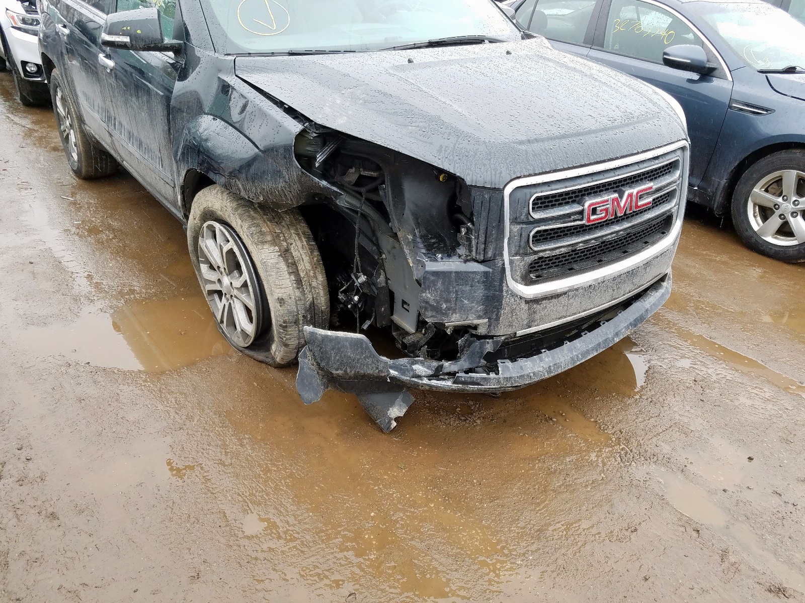Photo 9 from auction – 2014 GMC ACADIA SLT with VIN 1GKKRRKD8EJ340599