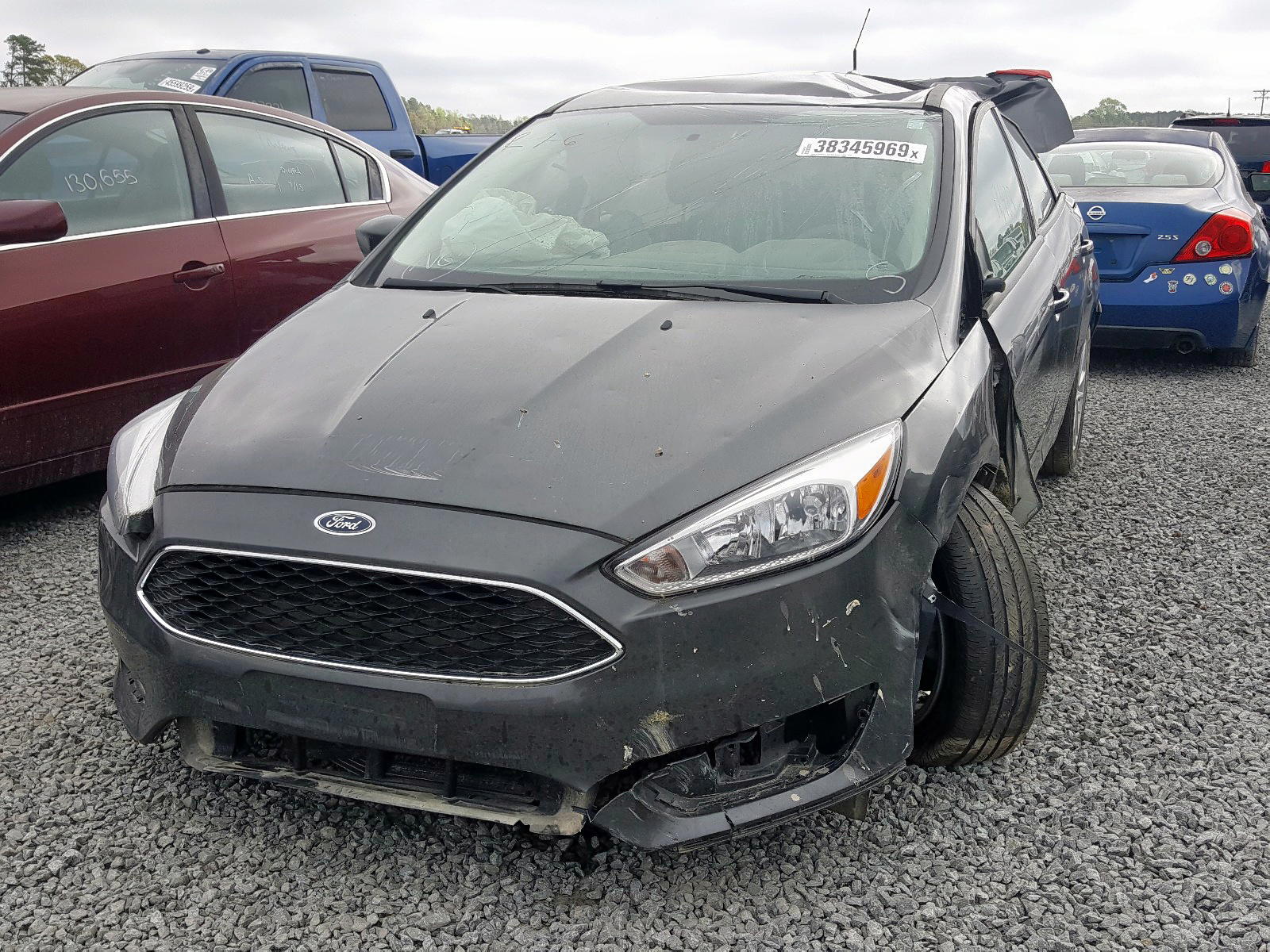 Photo 2 from auction – 2018 FORD FOCUS SE with VIN 1FADP3F25JL291348