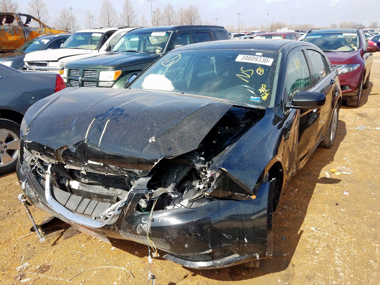 Photo 2 from auction – 2012 CHRYSLER 200 TOURIN with VIN 1C3CCBBG9CN107487