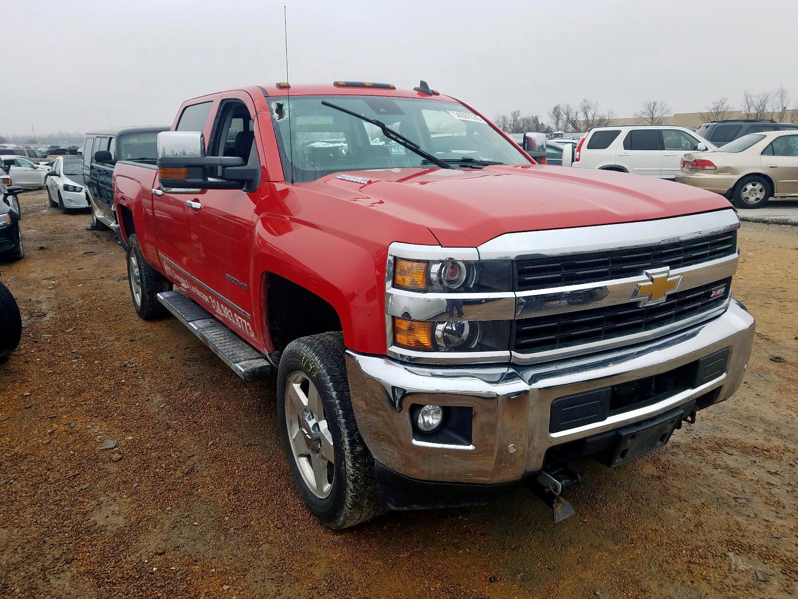 CHEVROLET SILVERADO 2015 with VIN 1GC1KWE85FF652246 - Photo from auction
