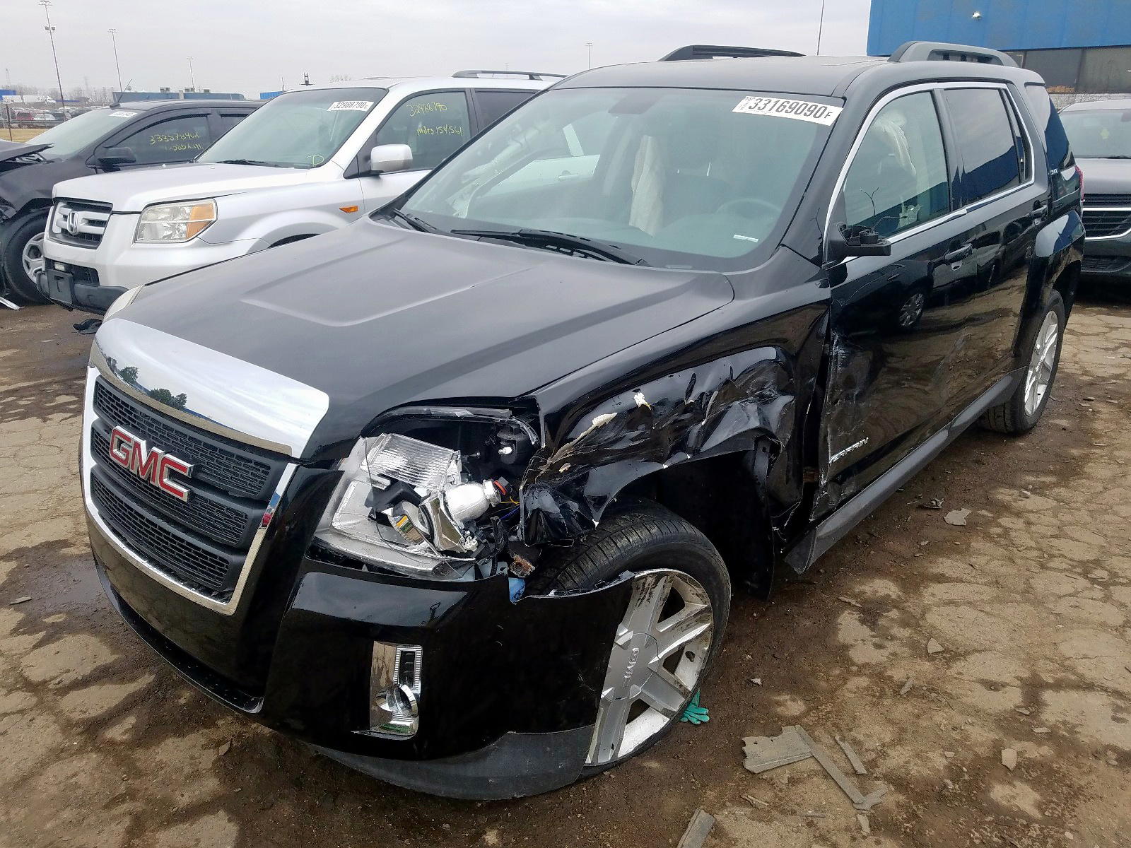 Photo 2 from auction – 2011 GMC TERRAIN SL with VIN 2CTFLUE54B6403359