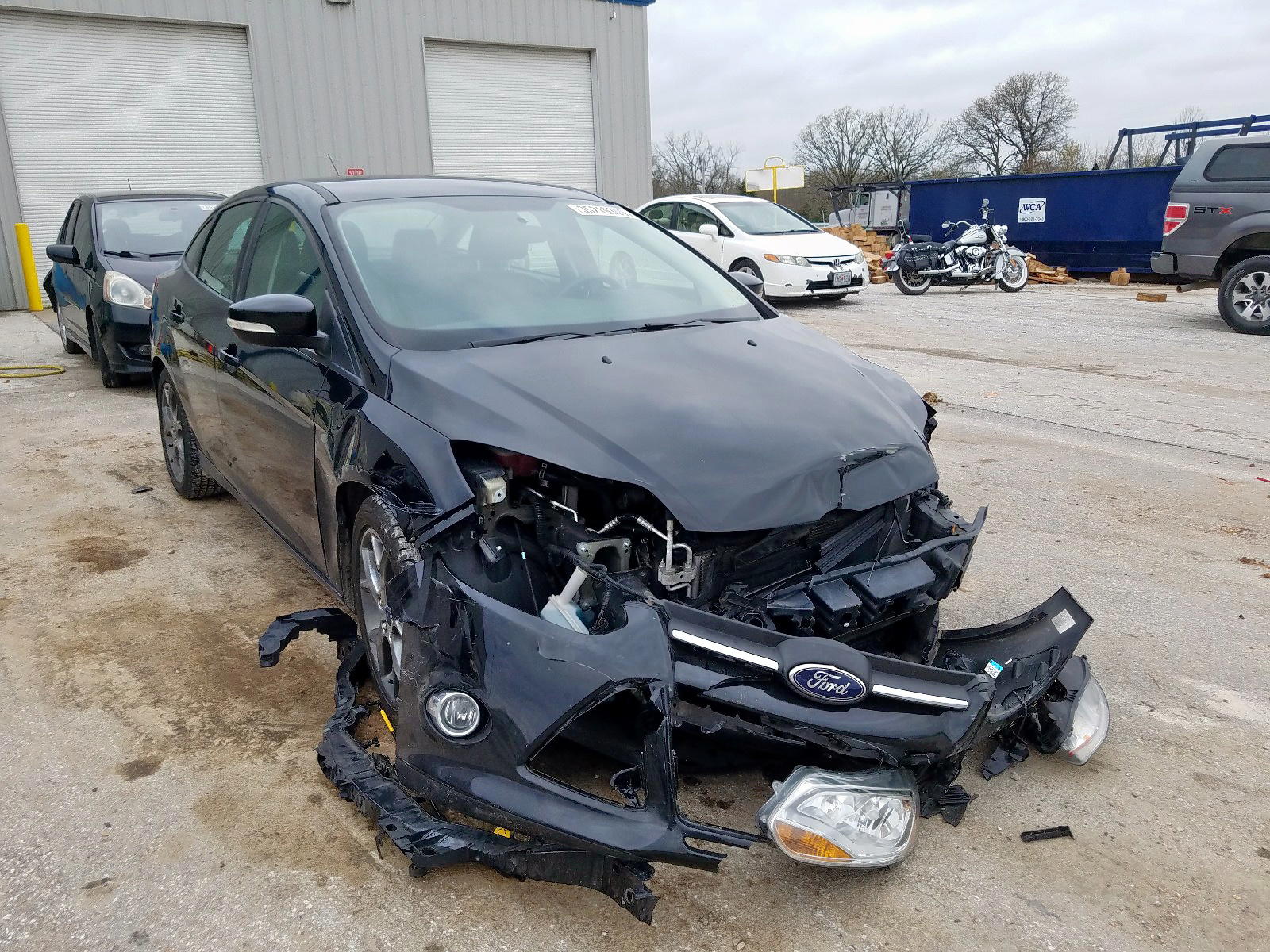 FORD FOCUS SE 2014 with VIN 1FADP3F22EL123933 - Photo from auction
