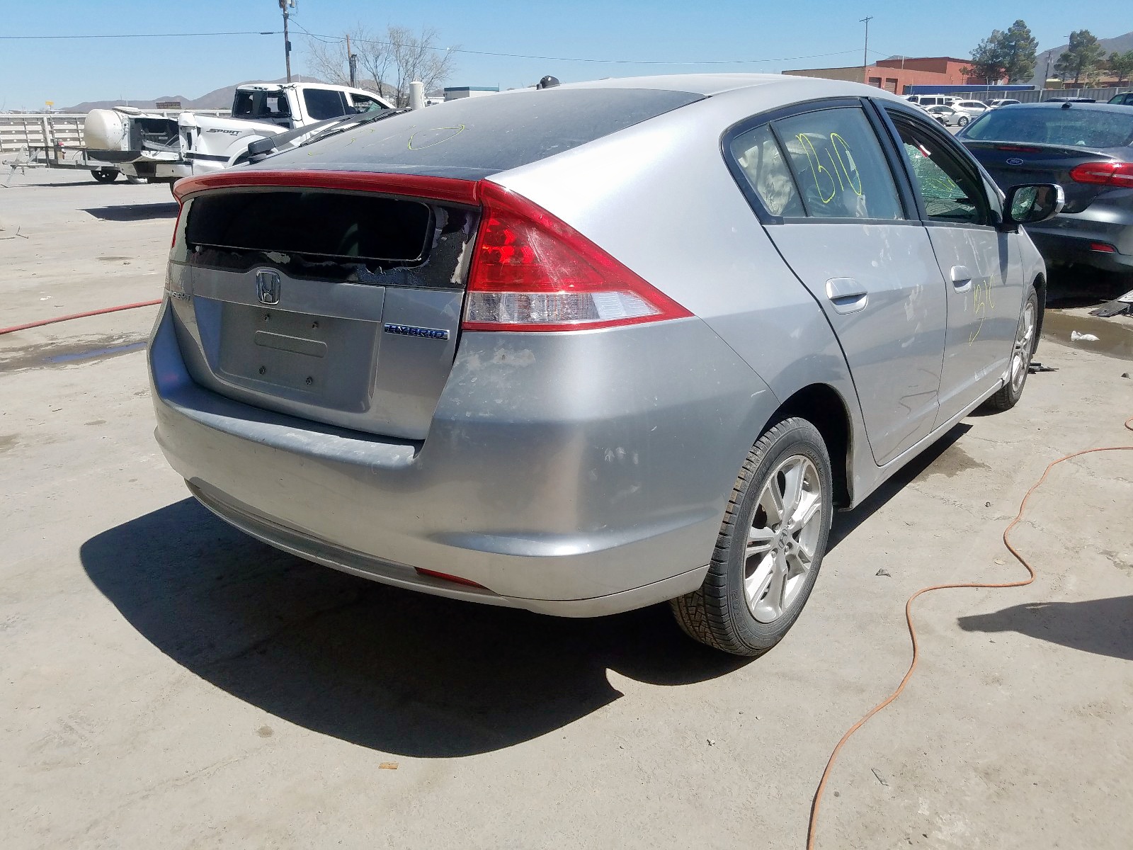 Photo 4 from auction – 2010 HONDA INSIGHT EX with VIN JHMZE2H74AS036431