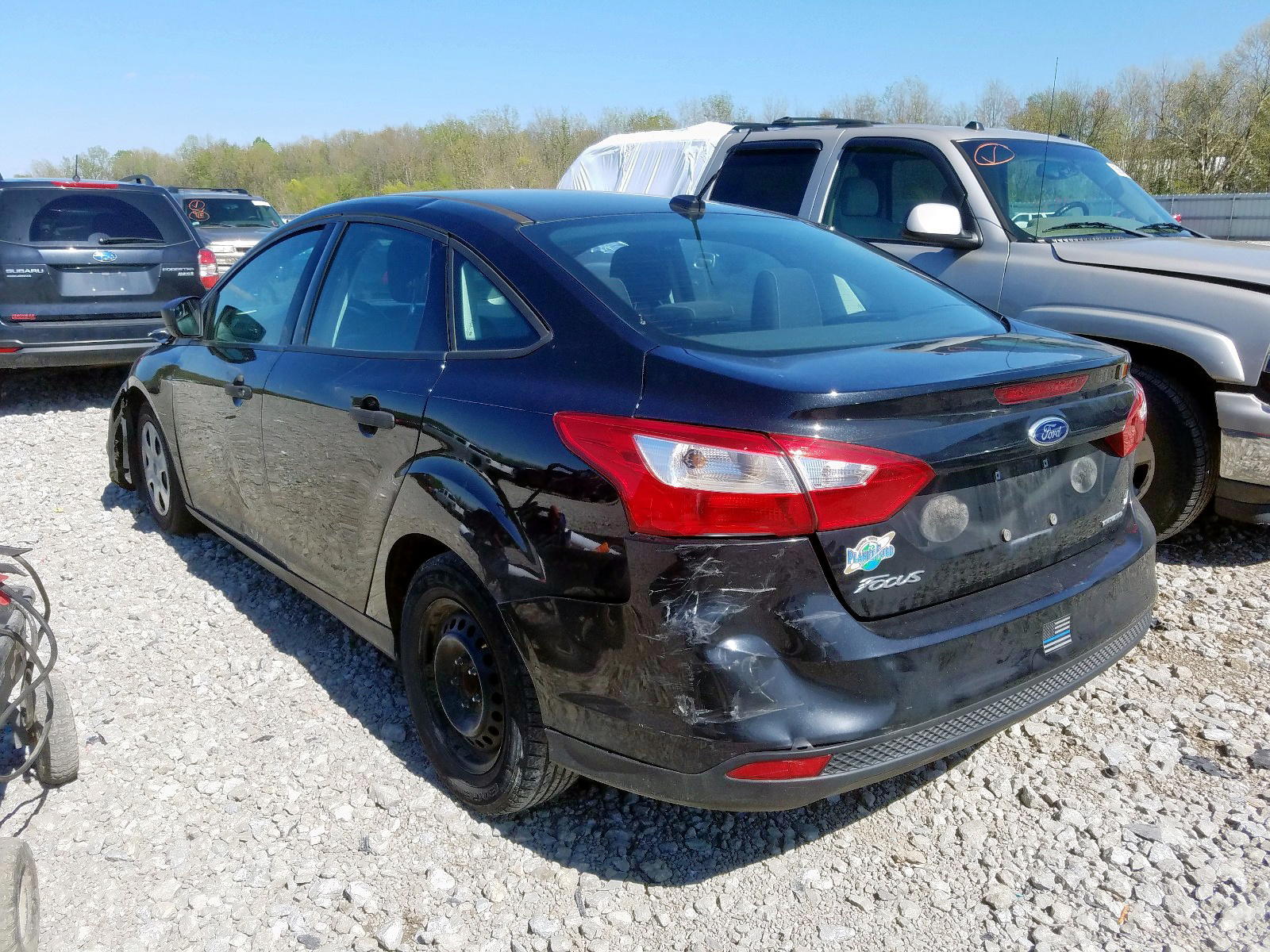 Photo 3 from auction – 2014 FORD FOCUS S with VIN 1FADP3E21EL419611