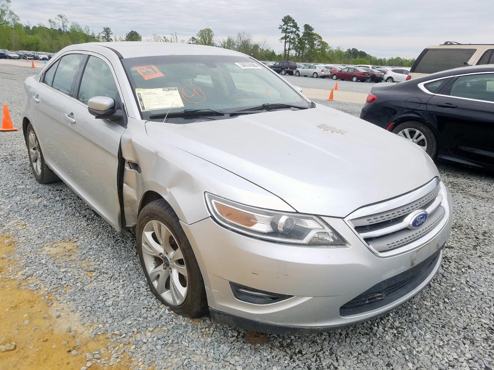 FORD TAURUS SEL 2012 with VIN 1FAHP2EWXCG113138 - Photo from auction