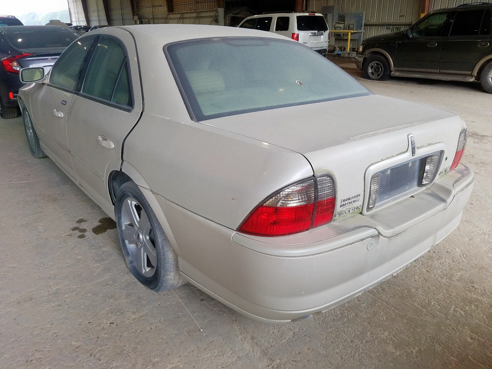 Photo 13 from auction – 2006 LINCOLN LS with VIN 1LNFM87AX6Y625586