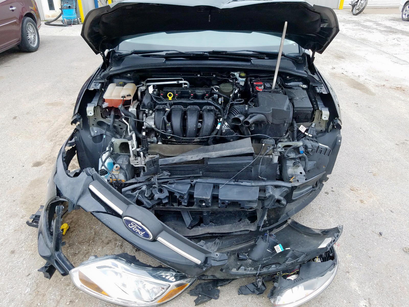 Photo 7 from auction – 2014 FORD FOCUS SE with VIN 1FADP3F22EL123933