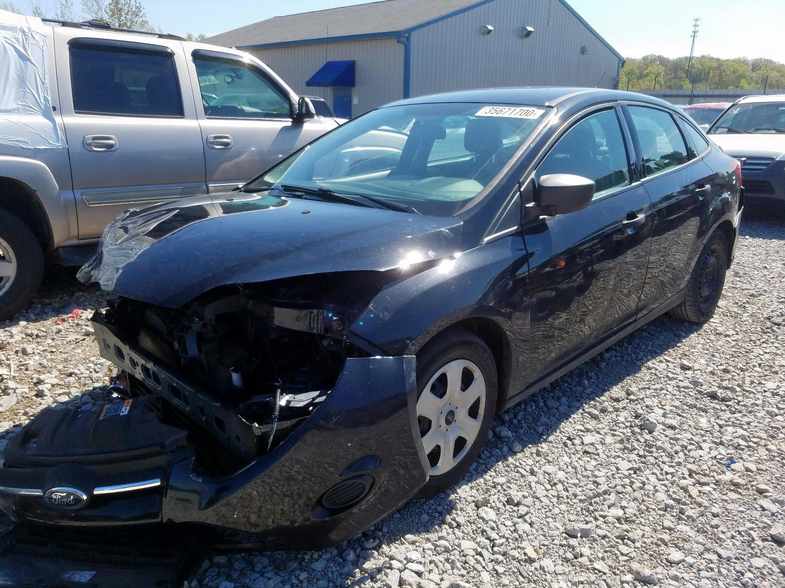 Photo 2 from auction – 2014 FORD FOCUS S with VIN 1FADP3E21EL419611