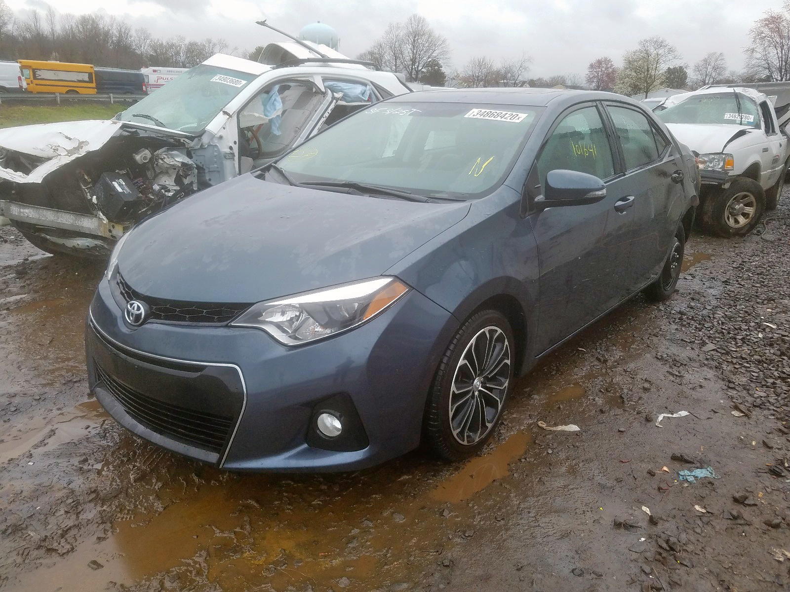 Photo 2 from auction – 2015 TOYOTA COROLLA L with VIN 2T1BURHE2FC323742
