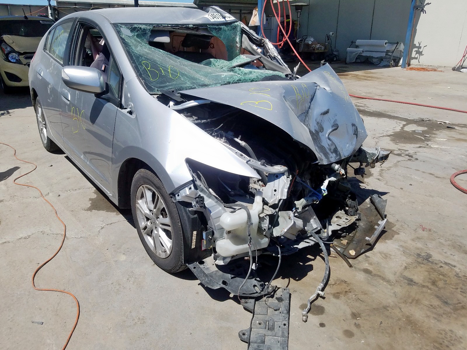 HONDA INSIGHT EX 2010 with VIN JHMZE2H74AS036431 - Photo from auction