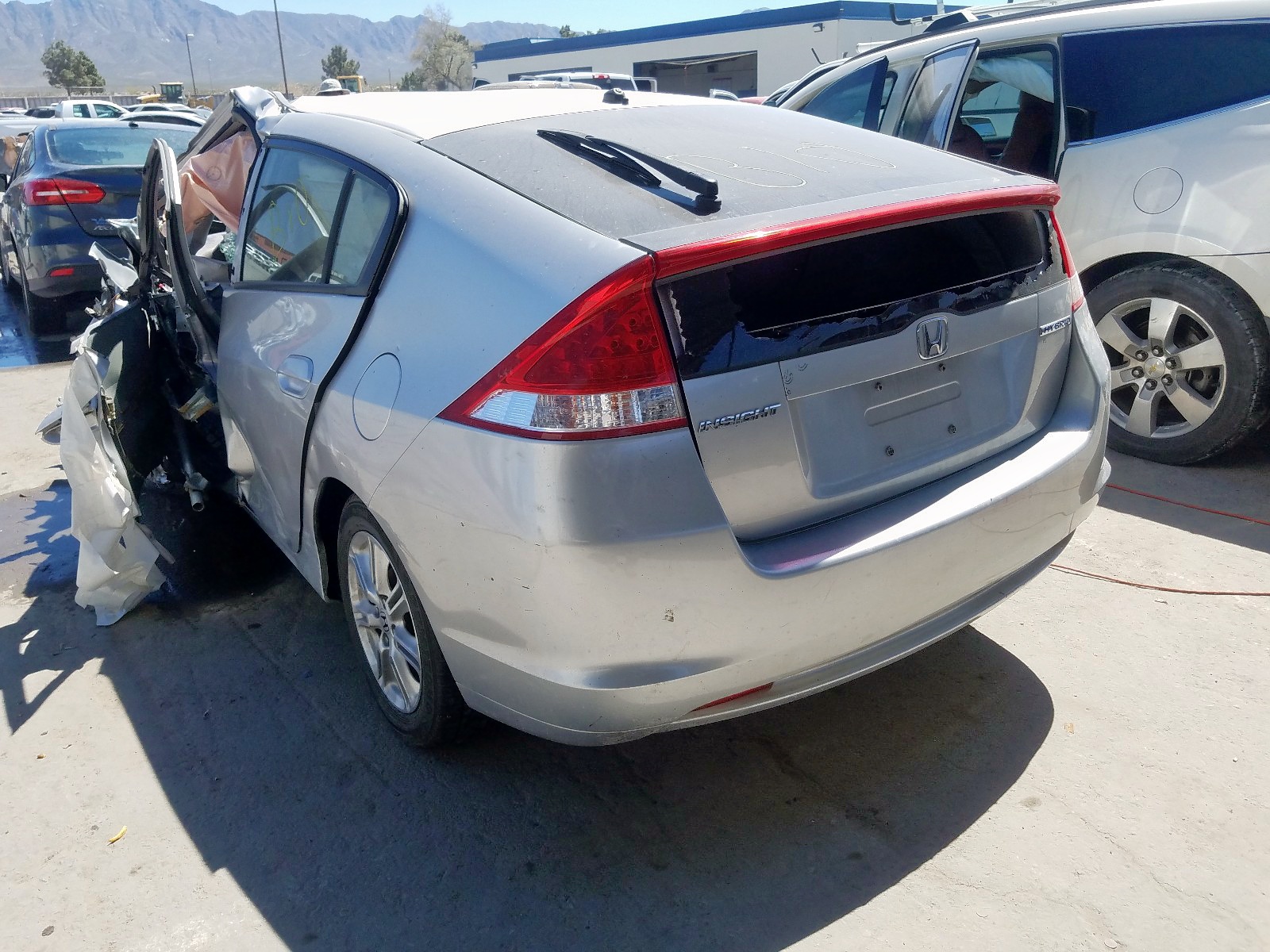 Photo 3 from auction – 2010 HONDA INSIGHT EX with VIN JHMZE2H74AS036431