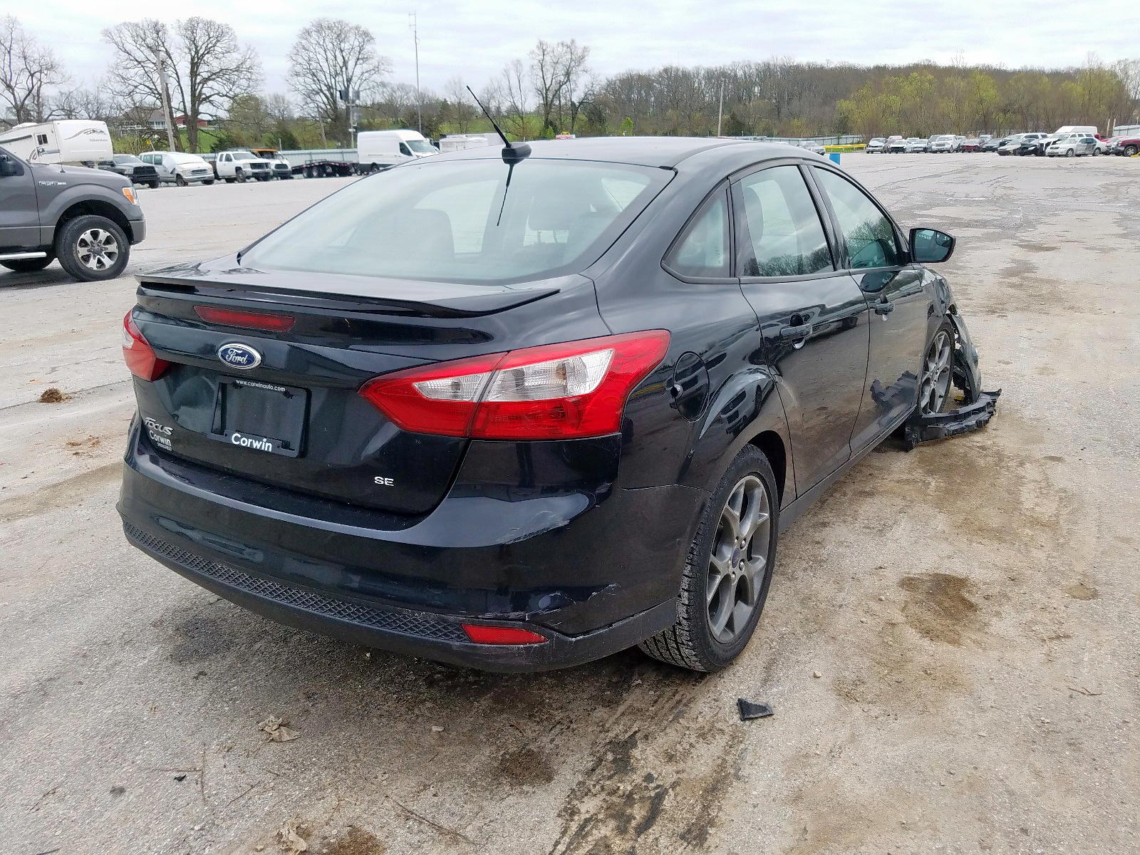 Photo 4 from auction – 2014 FORD FOCUS SE with VIN 1FADP3F22EL123933