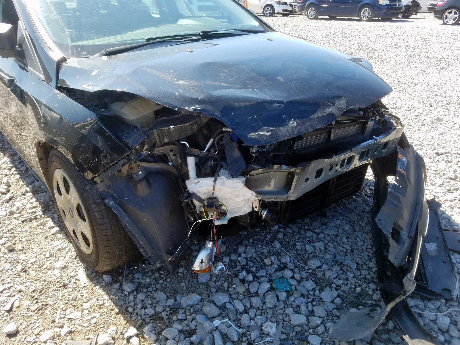 Photo 9 from auction – 2014 FORD FOCUS S with VIN 1FADP3E21EL419611