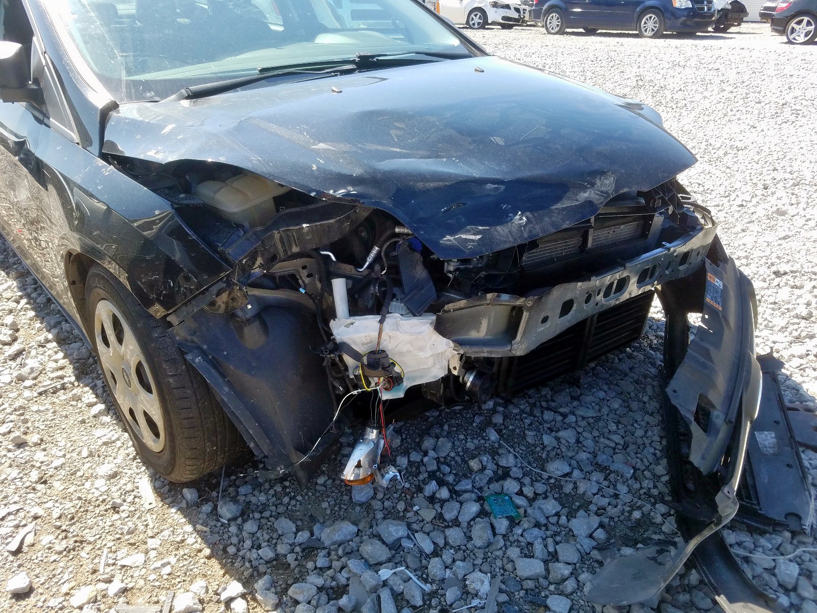 Снимка 9 от търг – 2014 FORD FOCUS S с VIN 1FADP3E21EL419611