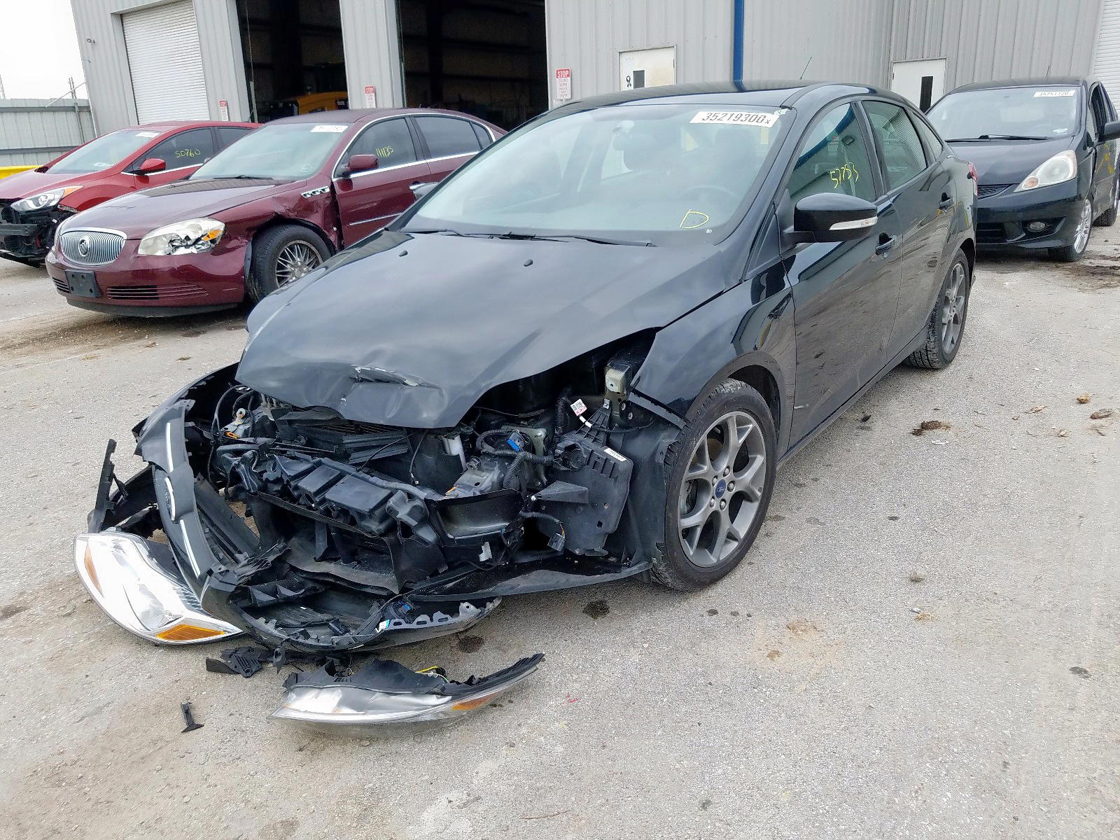 Photo 2 from auction – 2014 FORD FOCUS SE with VIN 1FADP3F22EL123933