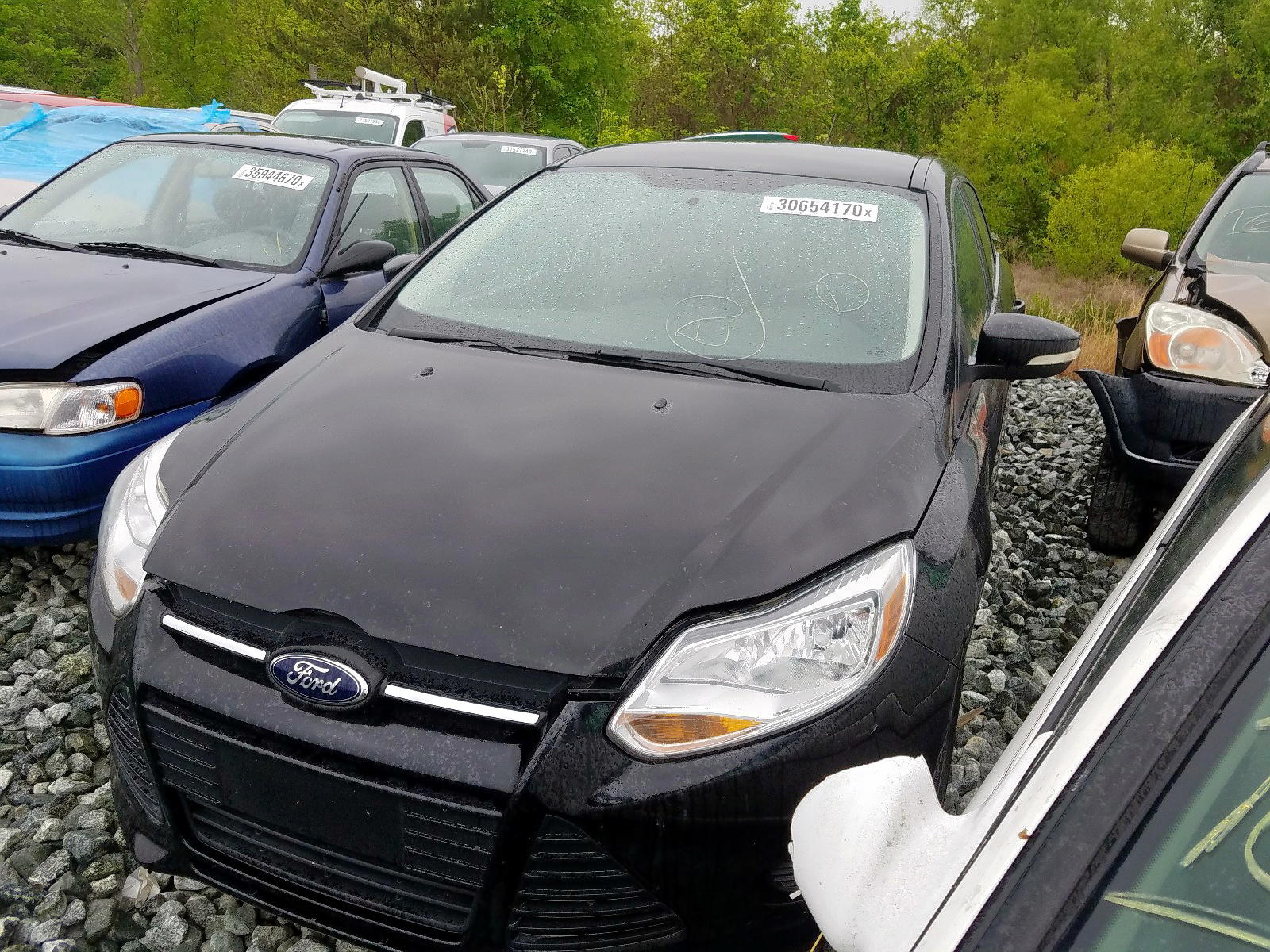 Photo 2 from auction – 2013 FORD FOCUS SE with VIN 1FADP3F29DL162386