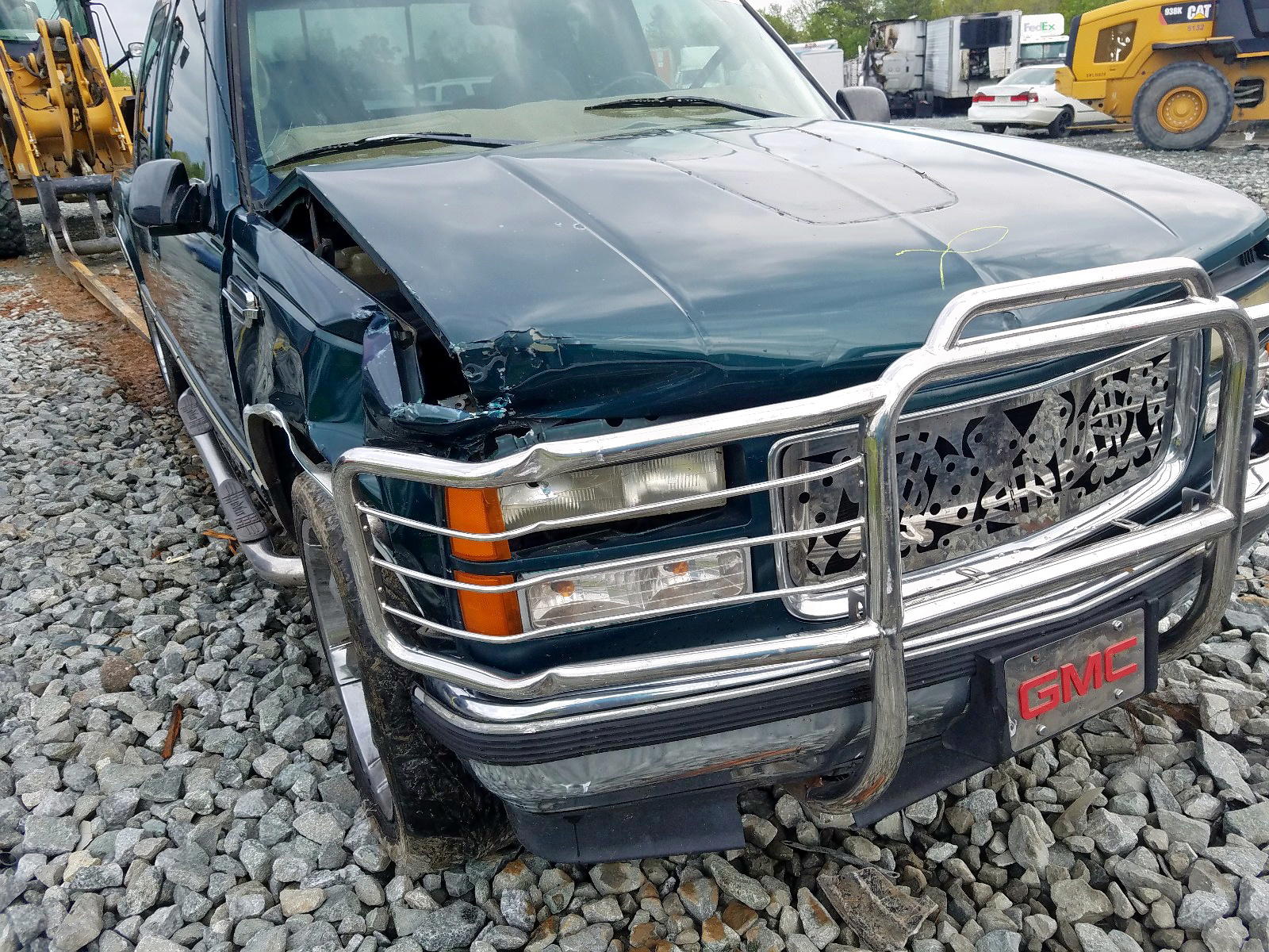 Photo 9 from auction – 1998 GMC SIERRA C15 with VIN 2GTEC19R5W1553700