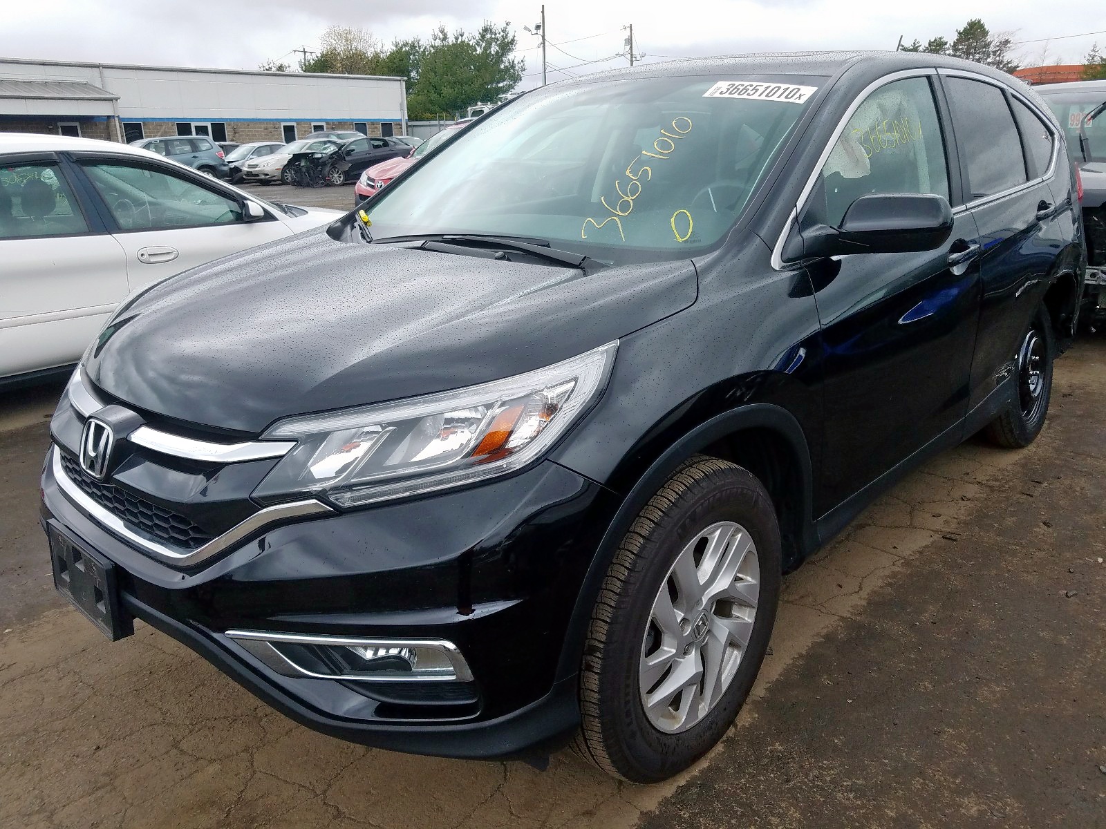 Photo 2 from auction – 2015 HONDA CR-V EX with VIN 2HKRM4H5XFH602502