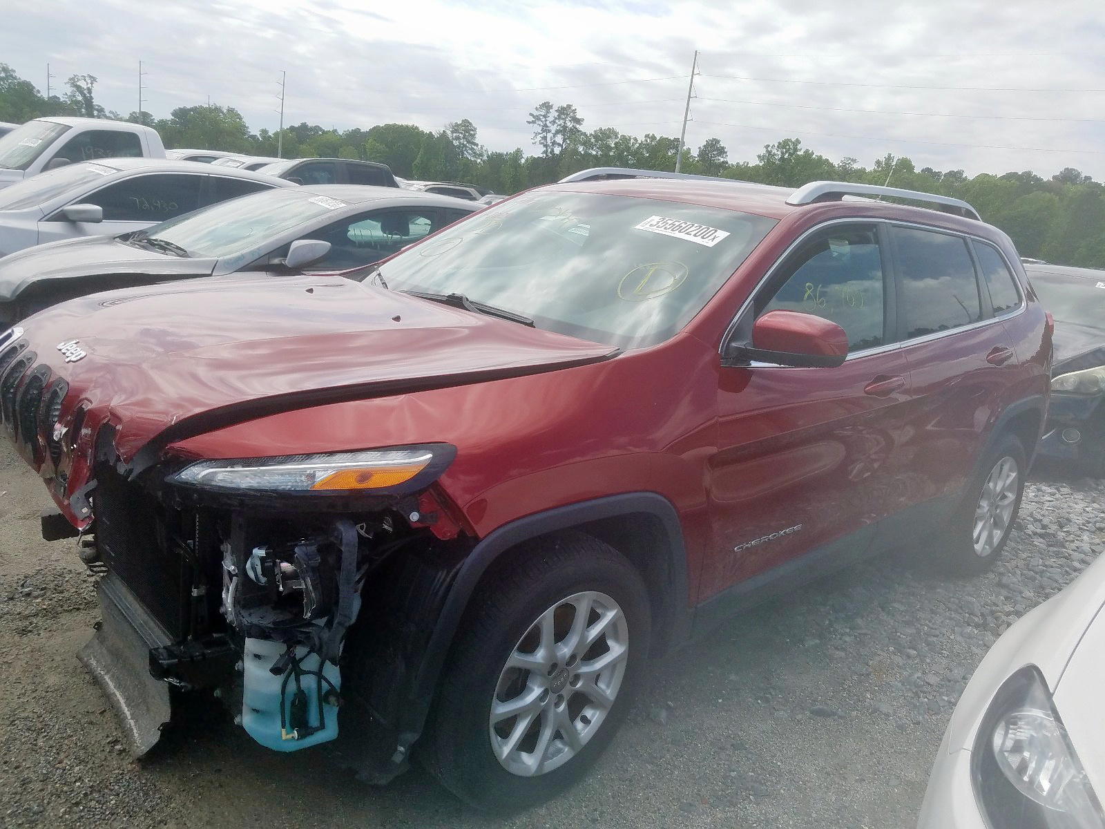 Photo 2 from auction – 2014 JEEP CHEROKEE L with VIN 1C4PJLCB2EW116380