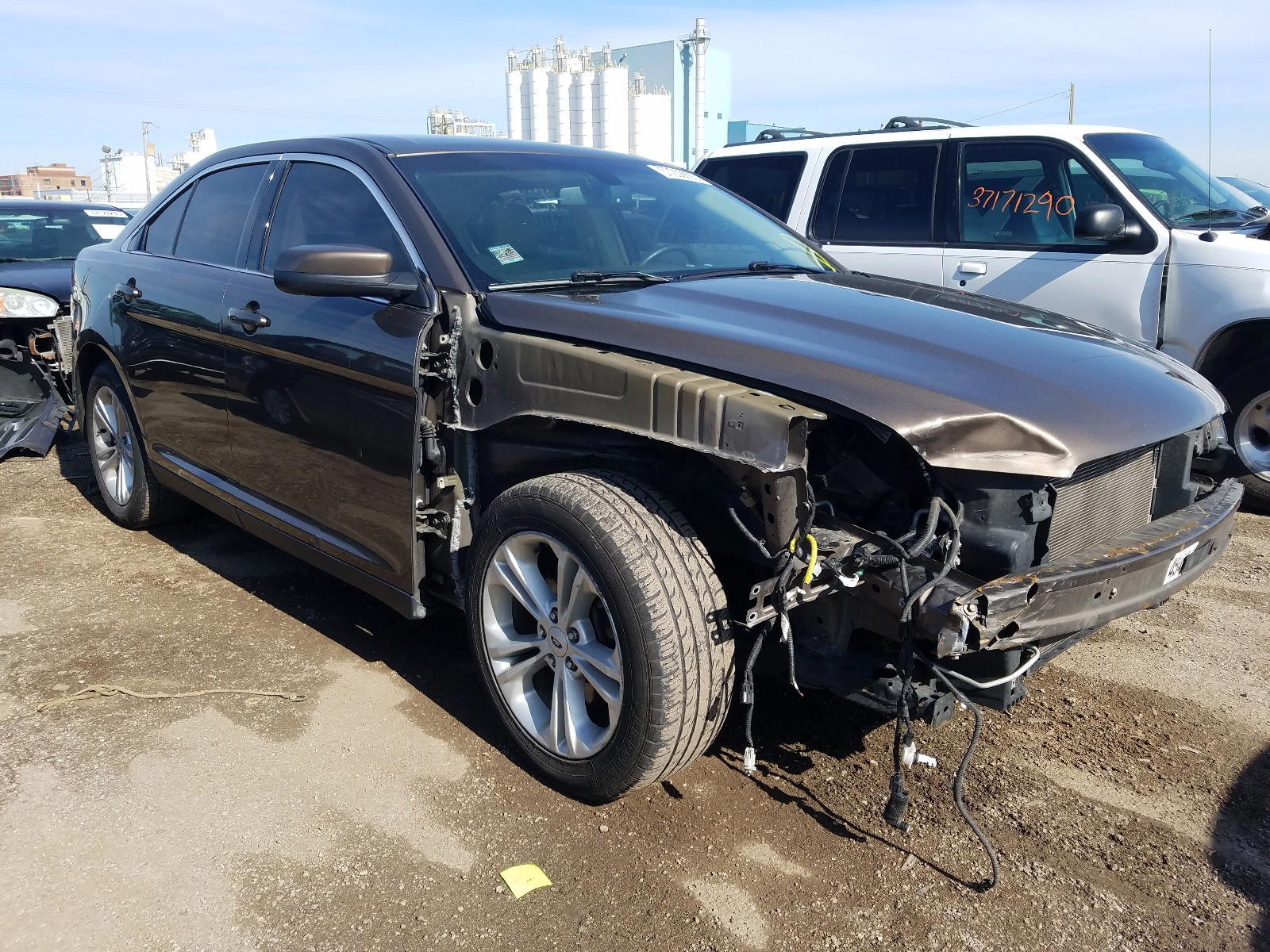 FORD TAURUS SEL 2015 with VIN 1FAHP2E89FG163969 - Photo from auction