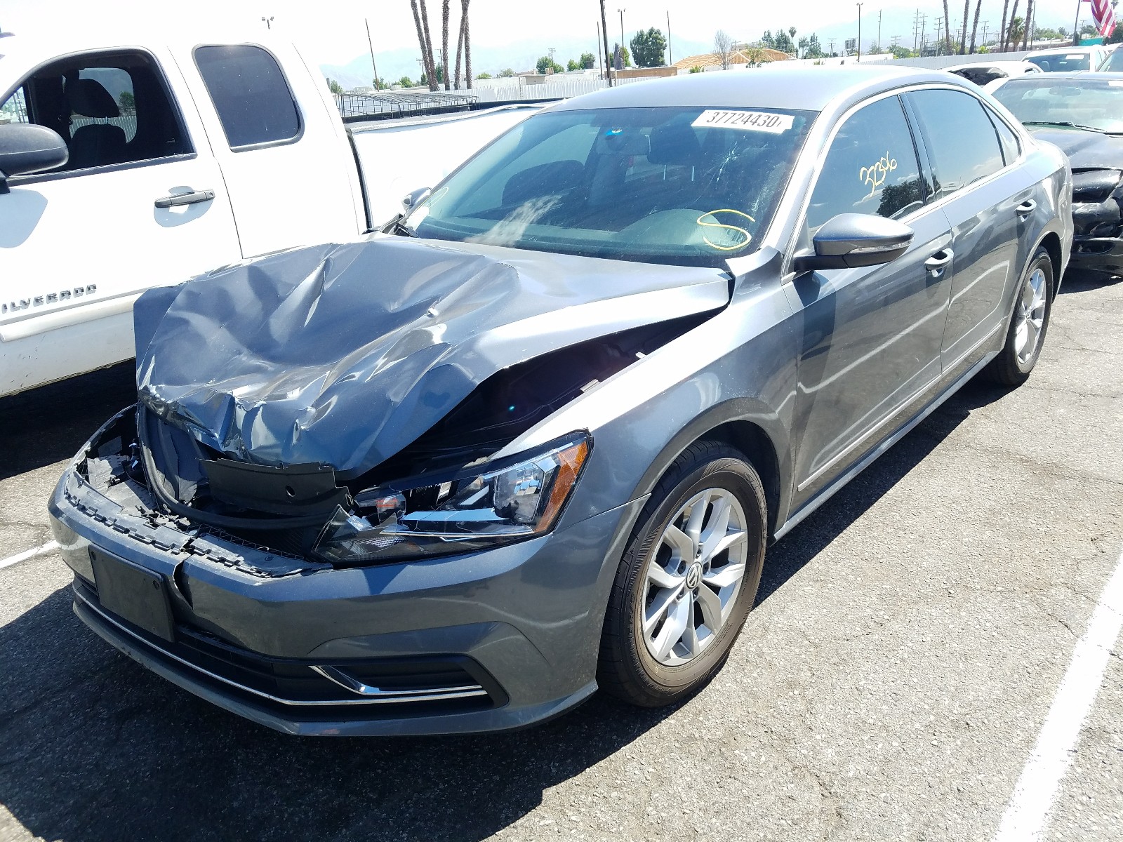 Photo 2 from auction – 2016 VOLKSWAGEN PASSAT S with VIN 1VWAT7A34GC014535