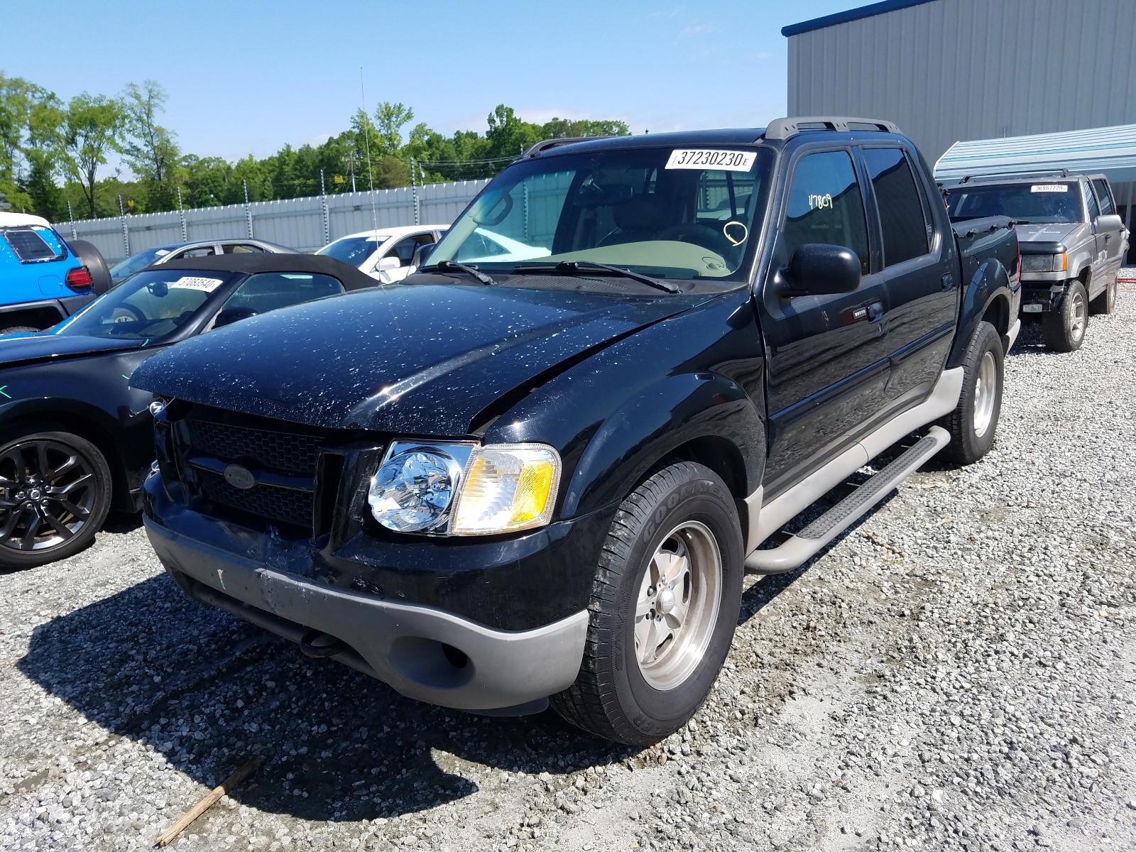 Photo 2 from auction – 2003 FORD EXPLORER S with VIN 1FMZU77E43UA59759