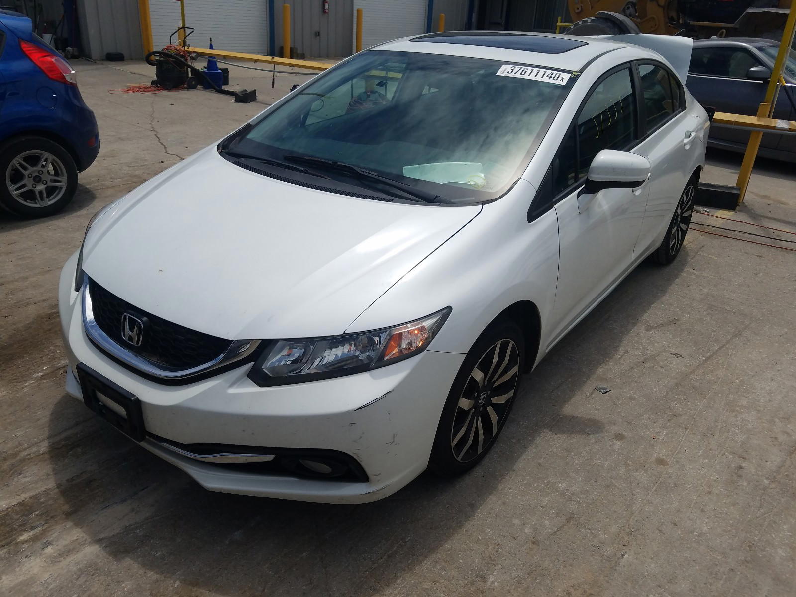 Photo 2 from auction – 2015 HONDA CIVIC EXL with VIN 19XFB2F99FE009687