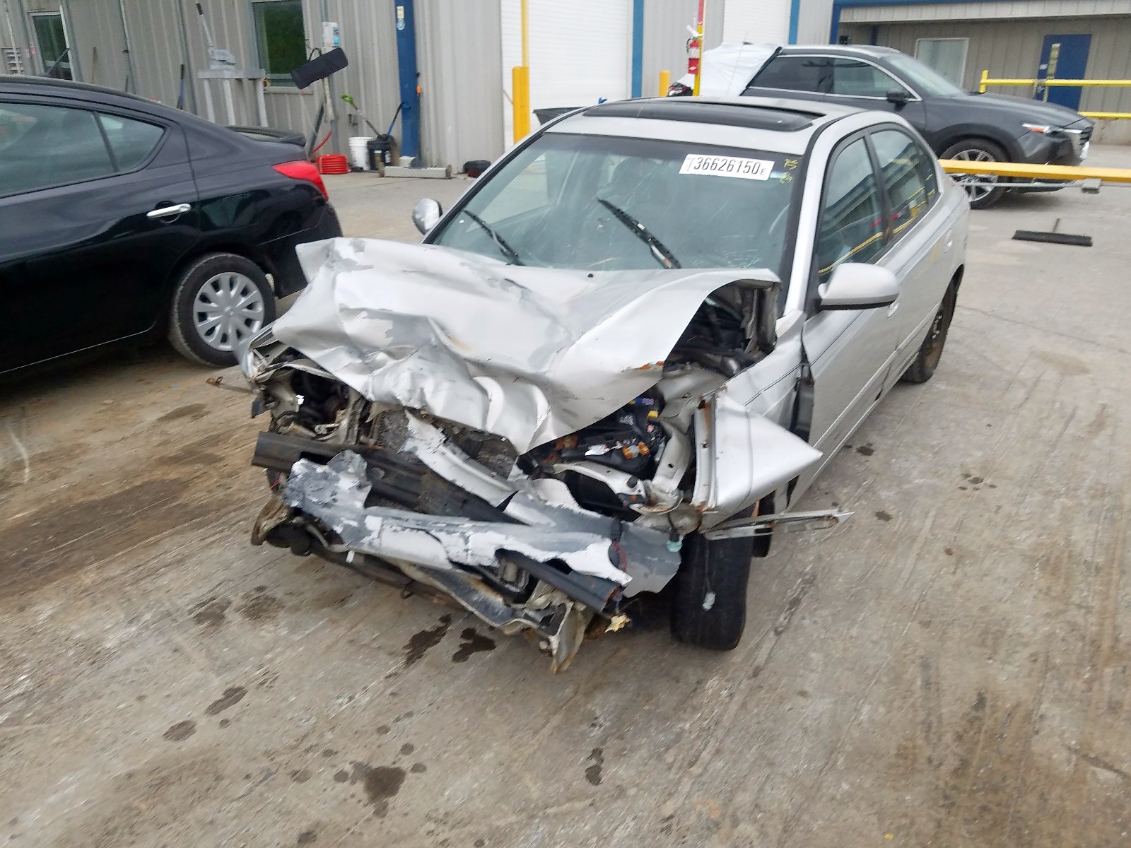 Photo 12 from auction – 2002 HYUNDAI ELANTRA GL with VIN KMHDN45D42U446147