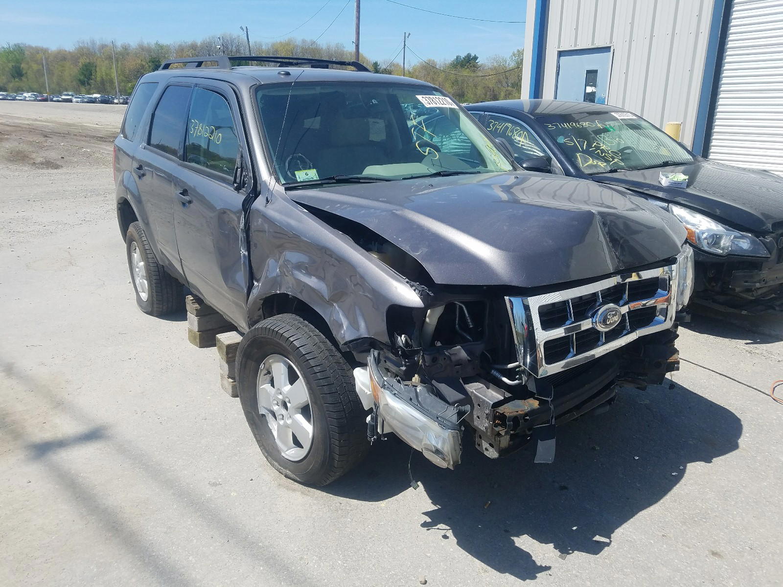 FORD ESCAPE XLT 2012 with VIN 1FMCU9DG9CKA80349 - Photo from auction