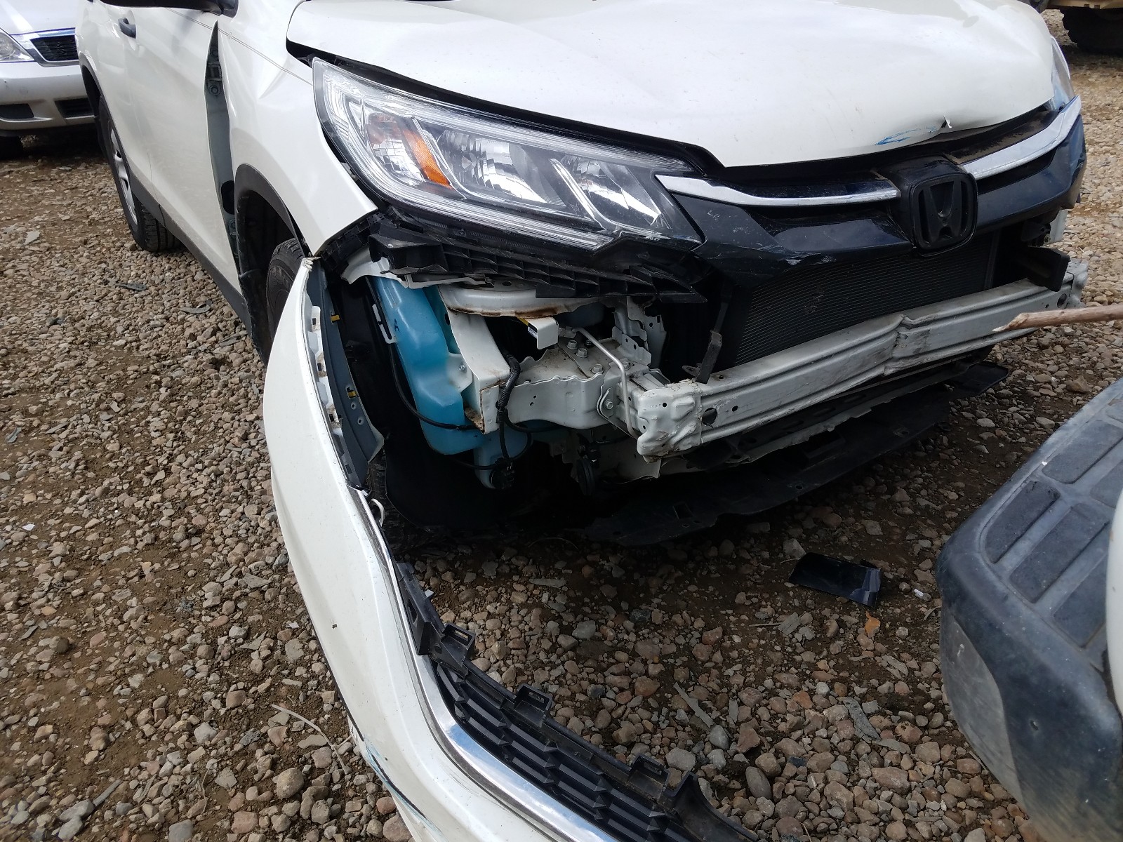 Photo 9 from auction – 2016 HONDA CR-V LX with VIN 5J6RM3H30GL022448
