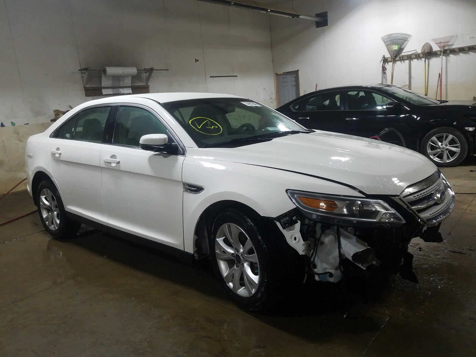 FORD TAURUS SEL 2010 with VIN 1FAHP2EW4AG153275 - Photo from auction
